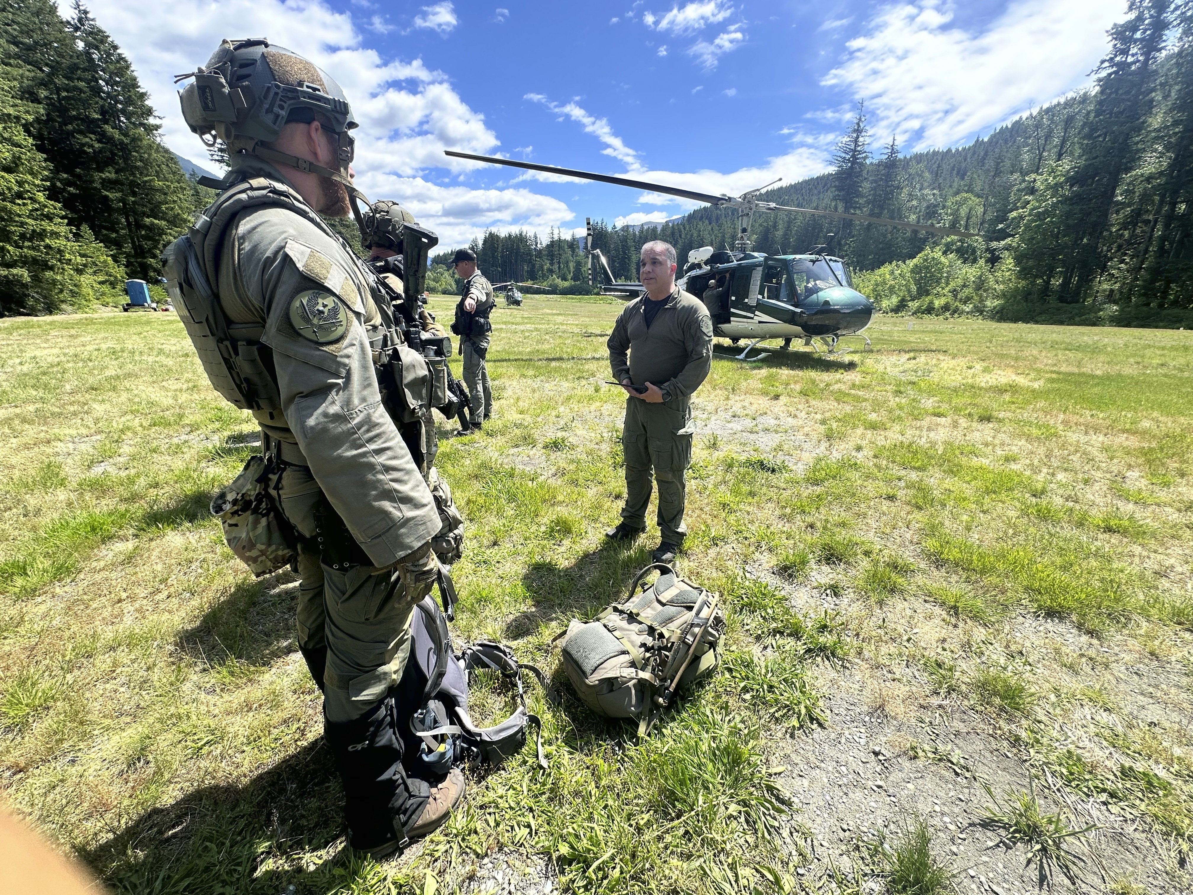 In this handout photo provided by the Snohomish County Sheriff's Office deputies participate in the search for Travis Decker, at an undisclosed location in Washington state, Friday, June 6, 2025. (Snohomish County Sheriff's Office photo via AP)