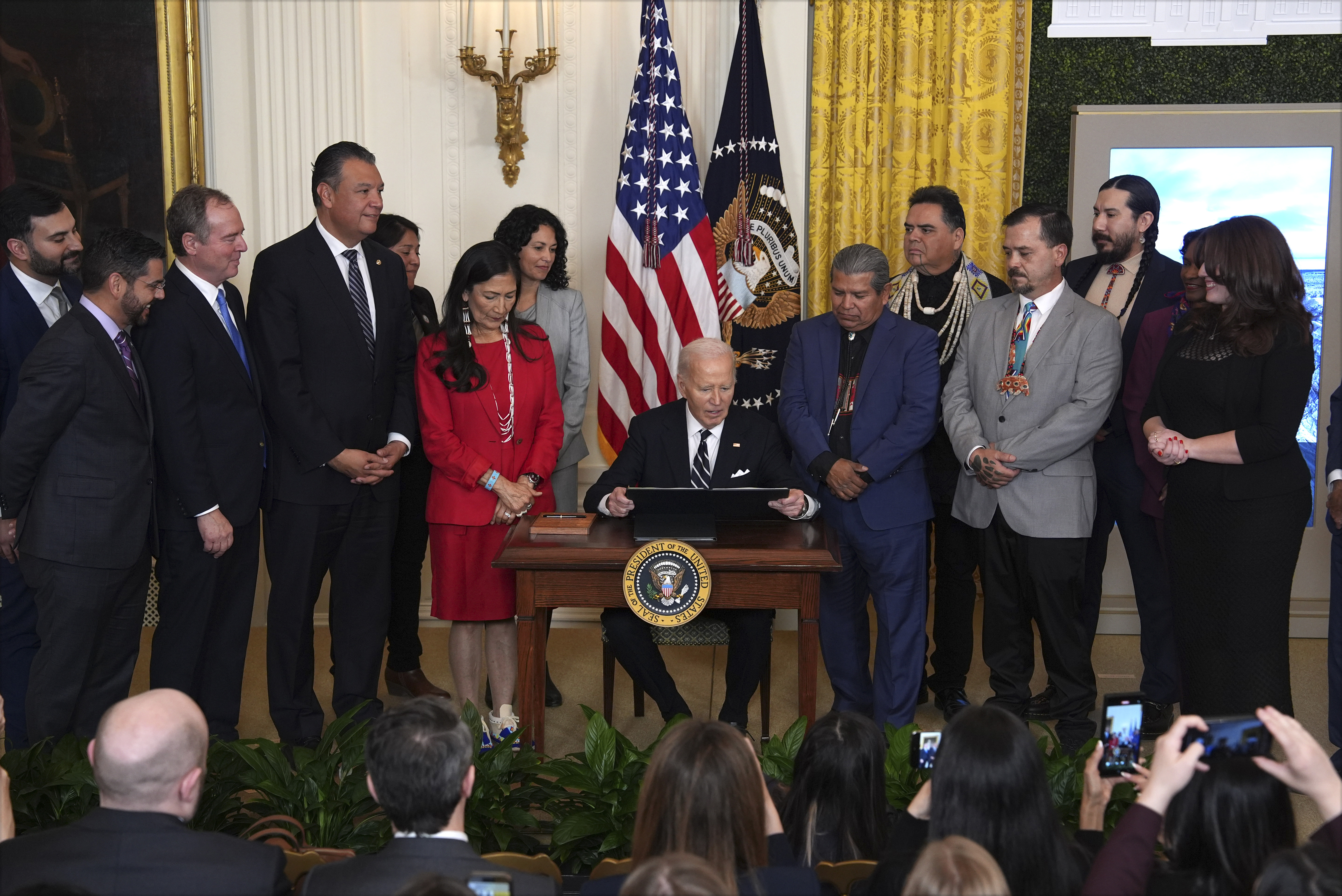FILE - President Joe Biden signs a proclamation to establish the Chuckwalla National Monument and the Sáttítla Highlands National Monument during an event in the East Room of the White House, Jan. 14, 2025, in Washington. (AP Photo/Evan Vucci, File)