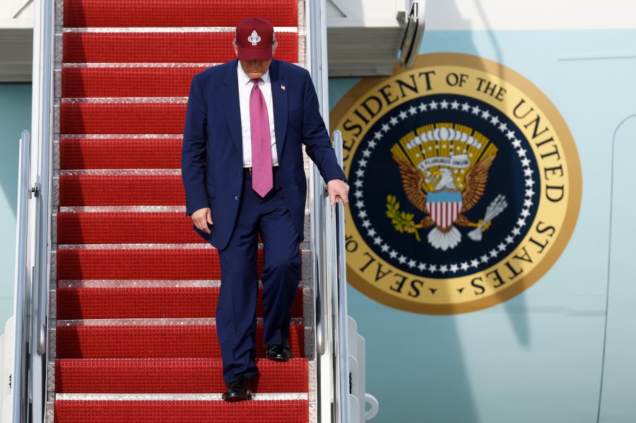 President Donald Trump walks down the stairs of Air Force One upon his arrival at Joint Base Andrews, Md., Tuesday, June 10, 2025. (AP Photo/Luis M. Alvarez)