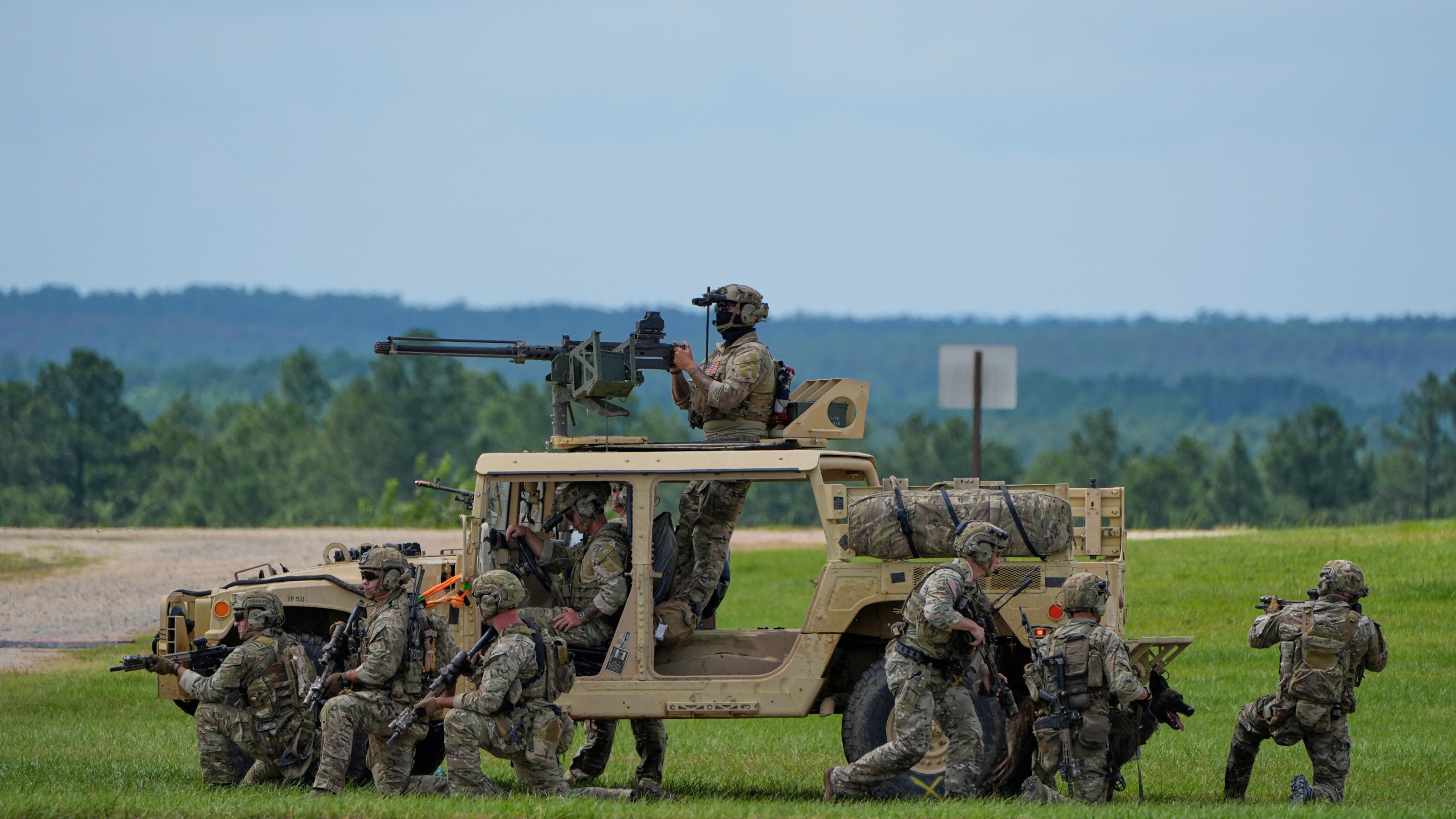 President Donald Trump observes a special operations command demonstration at Fort Bragg, Tuesday, June 10, 2025, in Fort Bragg, N.C. (AP Photo/Alex Brandon)