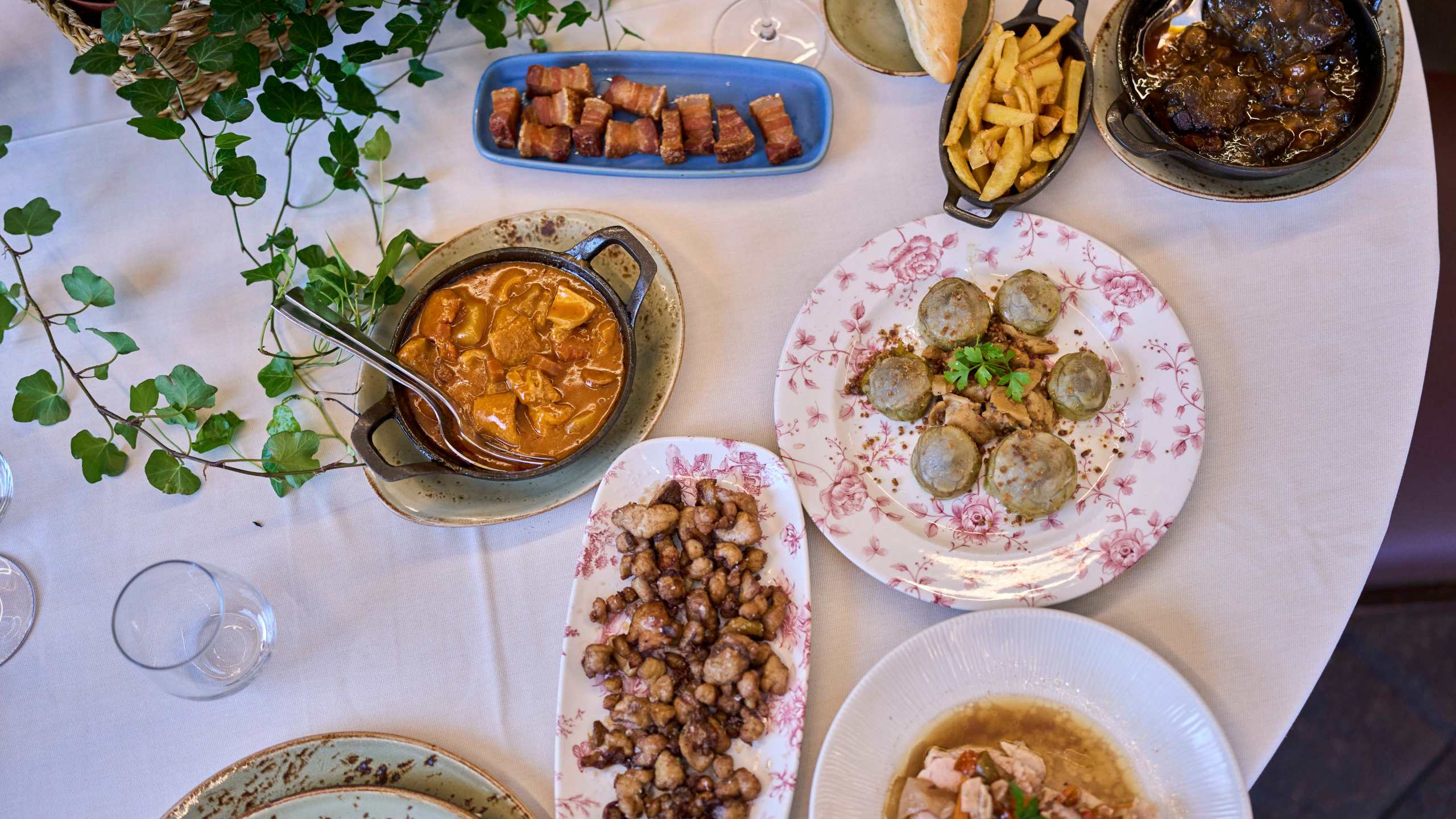 Several dishes from the restaurant's menu are photographed at Casa Pedro restaurant in Madrid, Spain, on May 16, 2025. (AP Photo/Manu Fernandez)