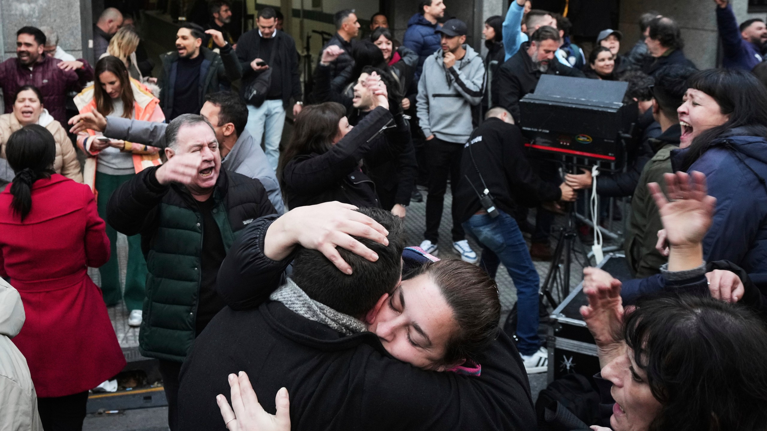 Supporters of former President Cristina Fernandez react after Argentina's Supreme Court upheld her corruption conviction, outside the Justicialist Party headquarters in Buenos Aires, Argentina, Tuesday, June 10, 2025. (AP Photo/Rodrigo Abd)