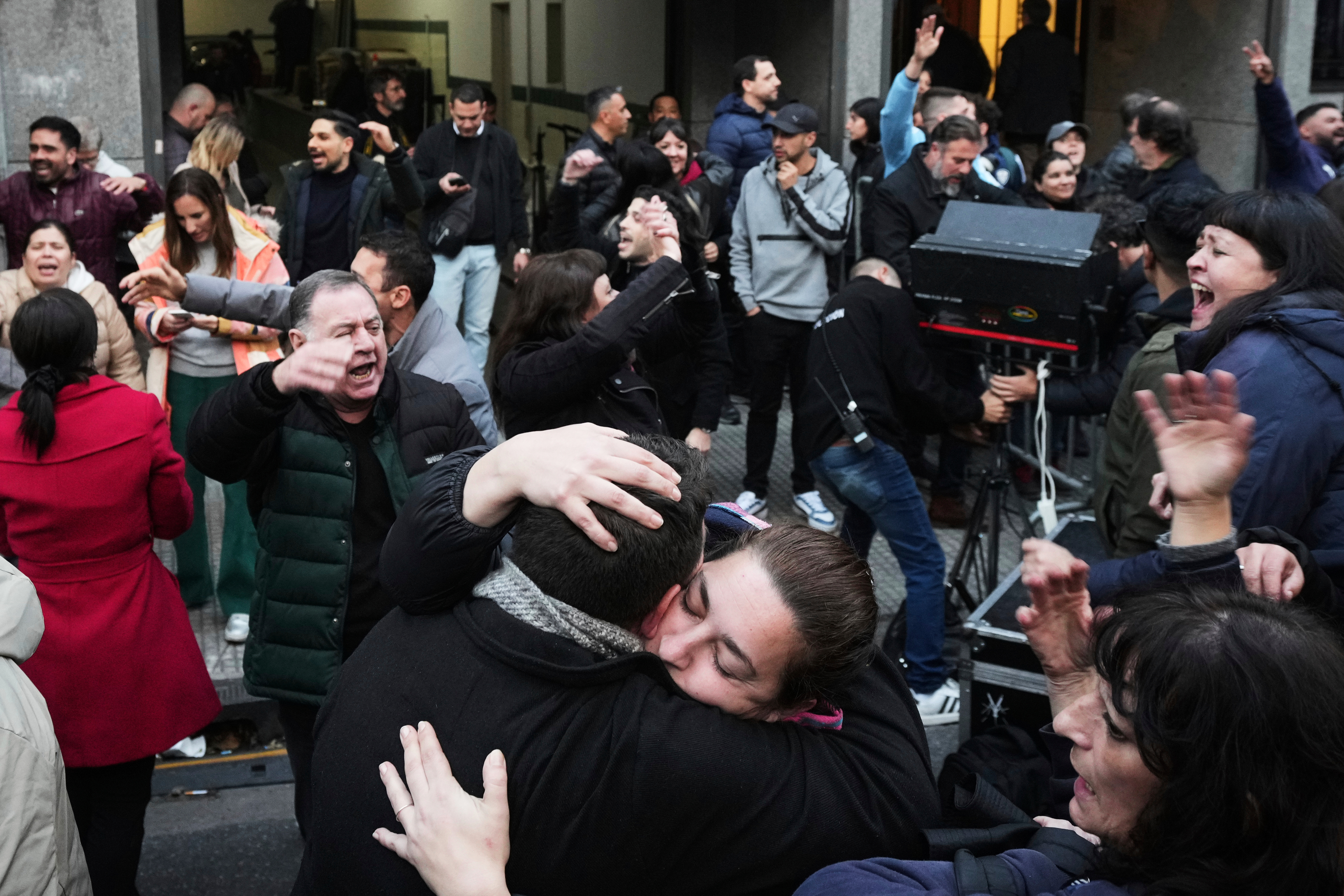 Supporters of former President Cristina Fernandez react after Argentina's Supreme Court upheld her corruption conviction, outside the Justicialist Party headquarters in Buenos Aires, Argentina, Tuesday, June 10, 2025. (AP Photo/Rodrigo Abd)