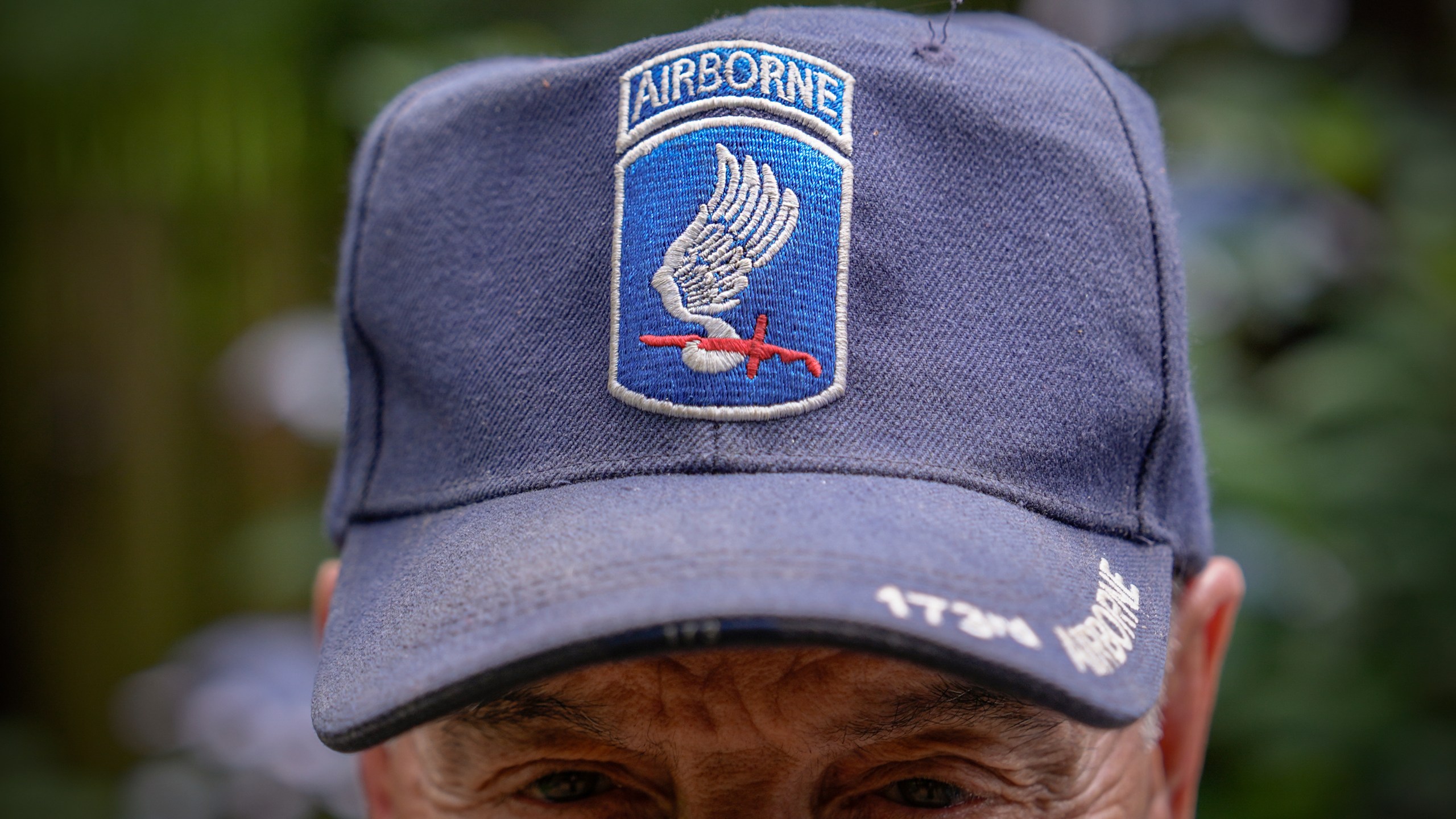 James McDonough wears a 173rd Airborne Brigade hat while posing for a portrait, Tuesday, June 10, 2025, in Crofton, Md. (AP Photo/Julia Demaree Nikhinson)