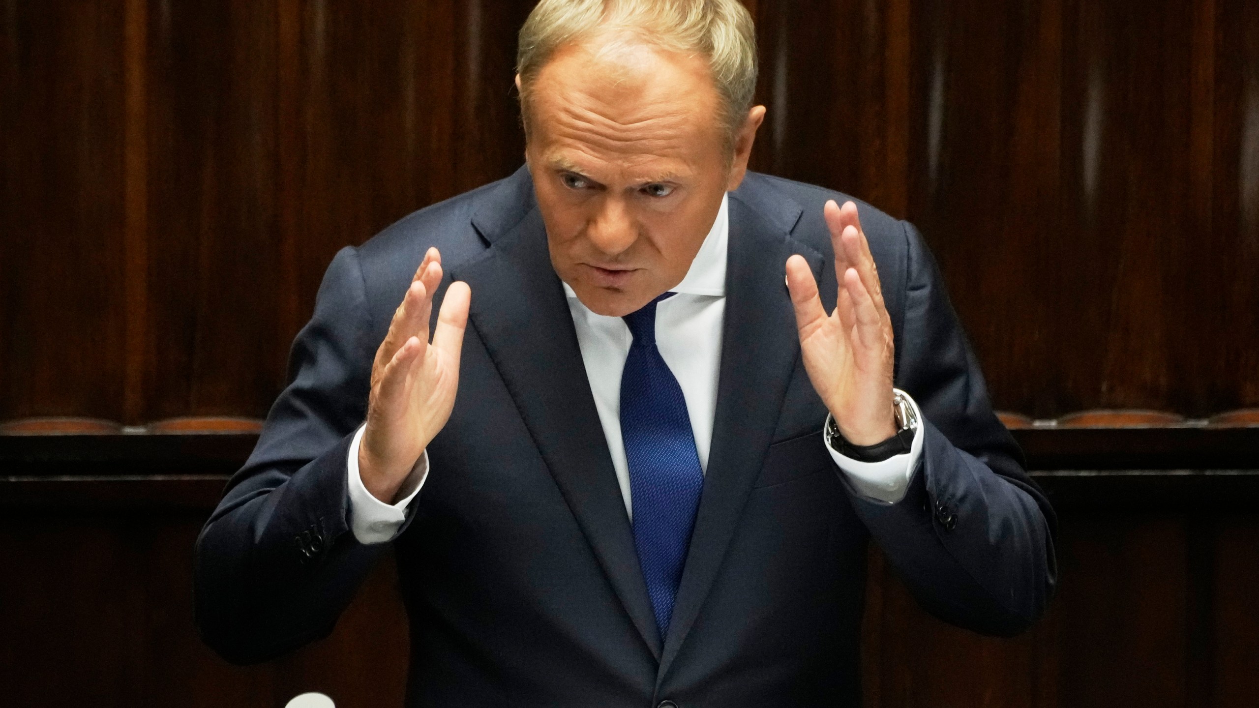 Poland's Prime Minister Donald Tusk addresses the Polish parliament on Wednesday, June 11, 2025, in Warsaw, Poland. (AP Photo/Czarek Sokolowski)