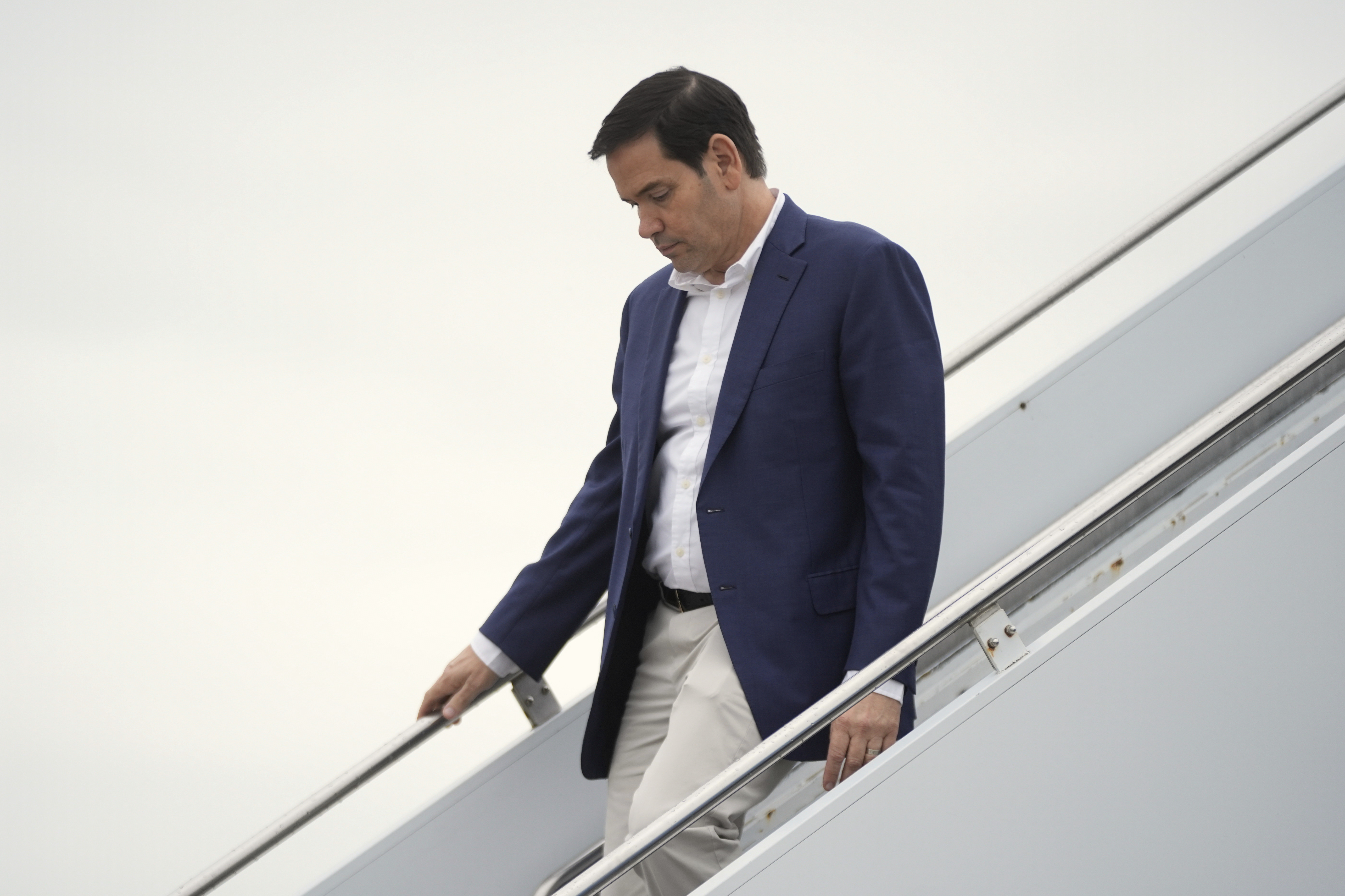 Secretary of State Marco Rubio arrives on Air Force One at Hagerstown Regional Airport, in Hagerstown, Md., on his was to Camp David, Md., Sunday, June 8, 2025. (AP Photo/Manuel Balce Ceneta)