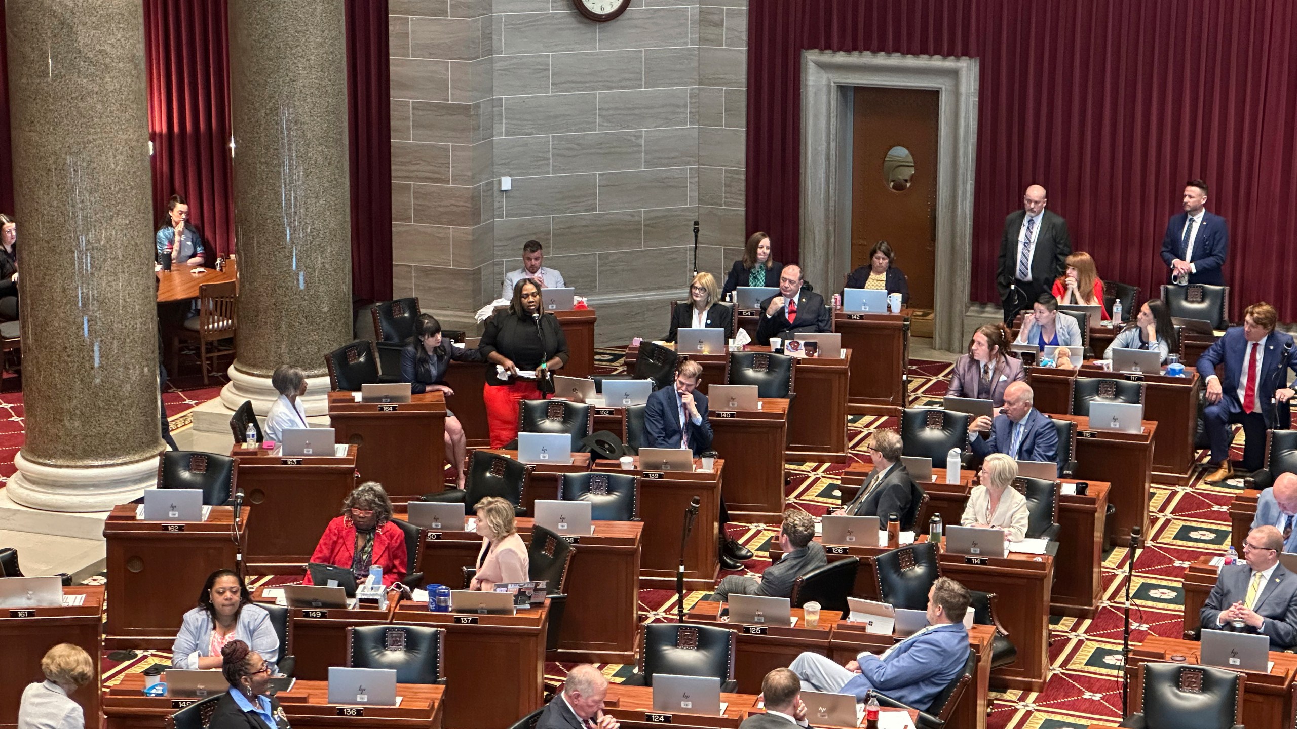 Missouri state Rep. Kimberly-Ann Collins describes for fellow lawmakers gathered in Jefferson City for a special session on Wednesday, June 11, 2025, how she watched a tornado hit her St. Louis home a month earlier. (AP Photo/David A. Lieb)