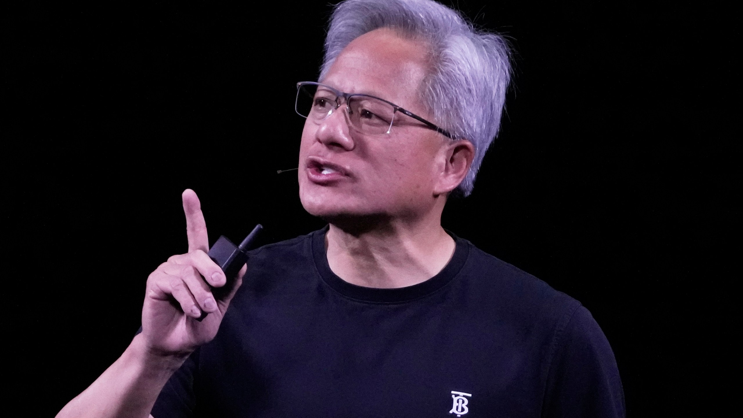 NVIDIA CEO Jensen Huang delivers his keynote address Wednesday, June 11, 2025 at the Vivatech fair in Paris. (AP Photo/Michel Euler)