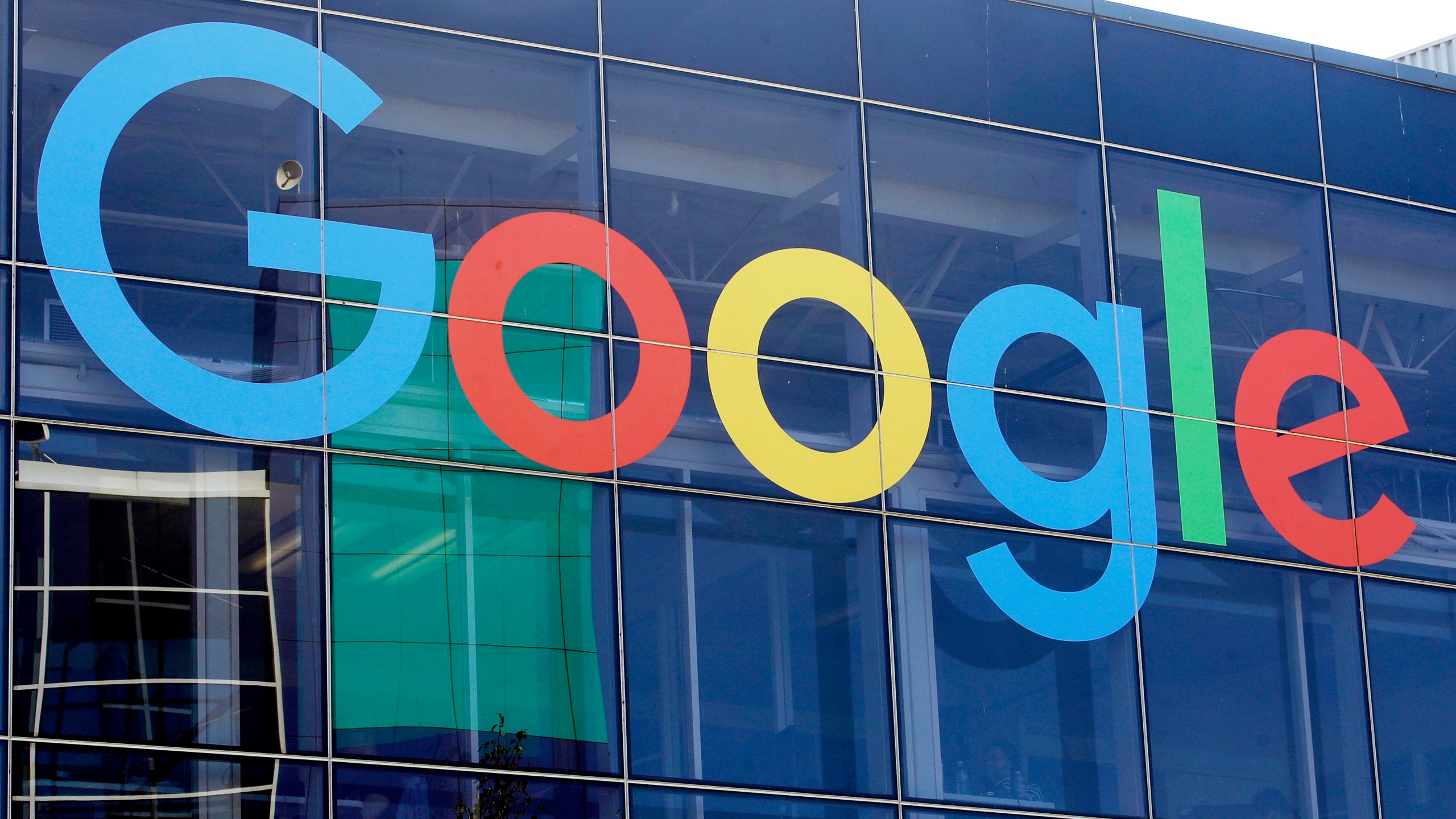 FILE - A sign is displayed on a Google building at their campus in Mountain View, Calif., Sept. 24, 2019. (AP Photo/Jeff Chiu, File)