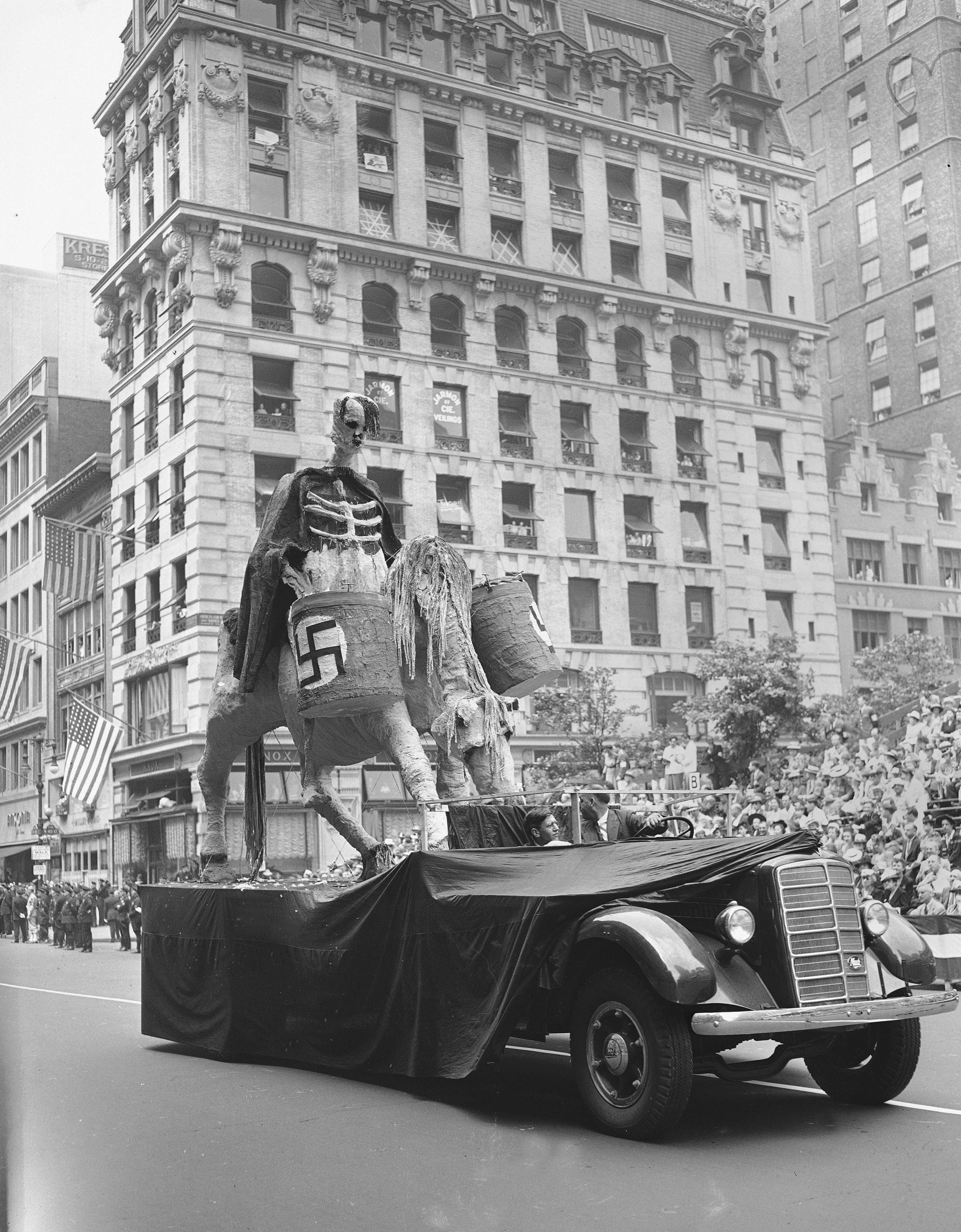 FILE - One of the floats in New York's war parade depicting Hitler in deaths' garb, rolls down Fifth Avenue in New York, June 13, 1942. (AP Photo, File)