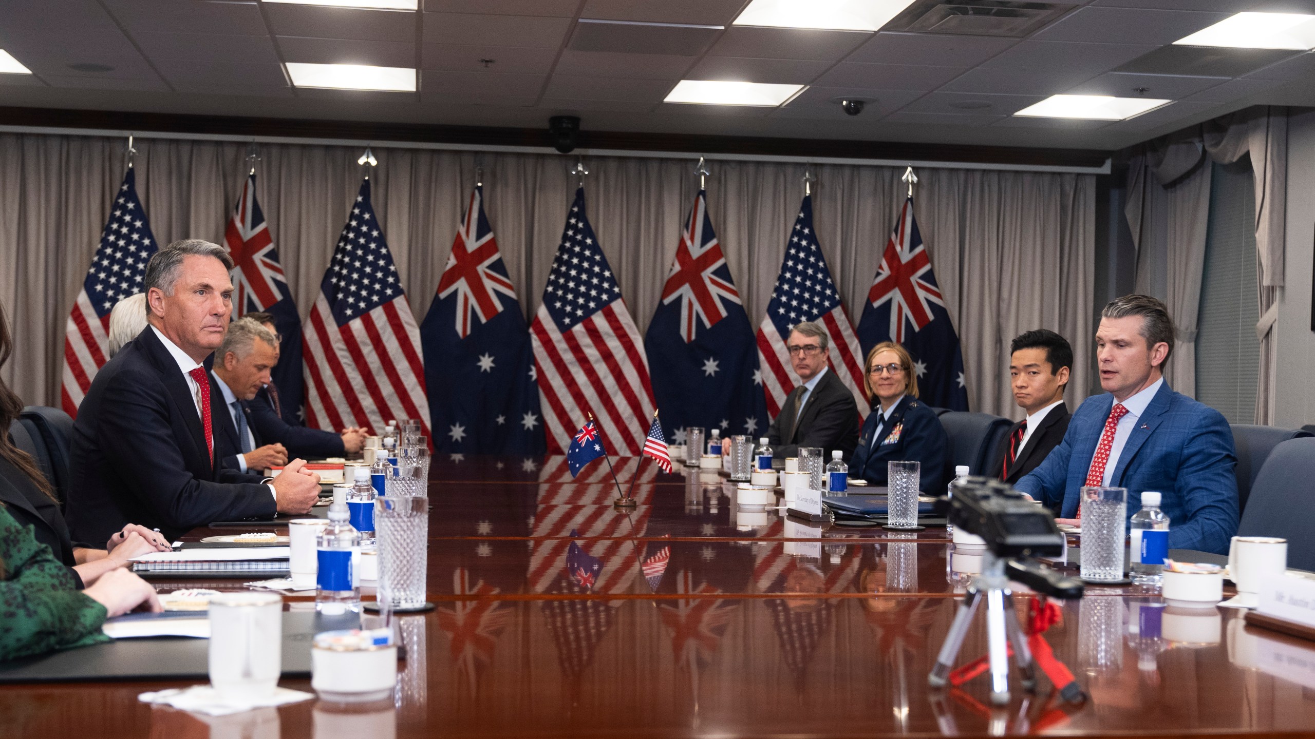 FILE - Secretary of Defense Pete Hegseth, right, welcomes Australian Deputy Prime Minister and Defense Minister Richard Marles, left, before the start of their meeting at the Pentagon, Friday, Feb. 7, 2025, in Washington. (AP Photo/Manuel Balce Ceneta, File)