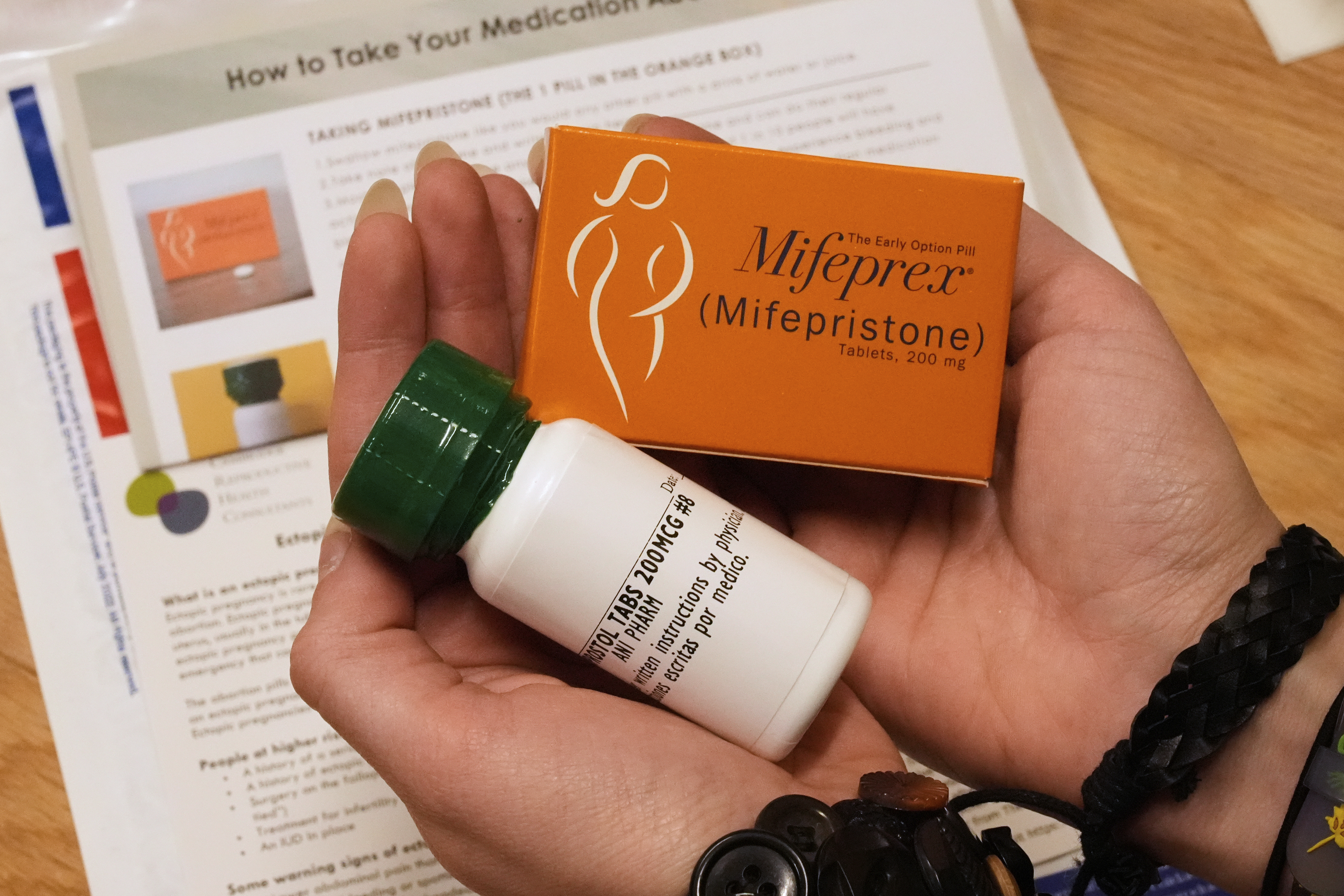 A coordinator shows the medications and care kit, which will be sent out the clients at Massachusetts Medication Abortion Access Project, May 13, 2025, in Somerville, Mass. (AP Photo/Charles Krupa)