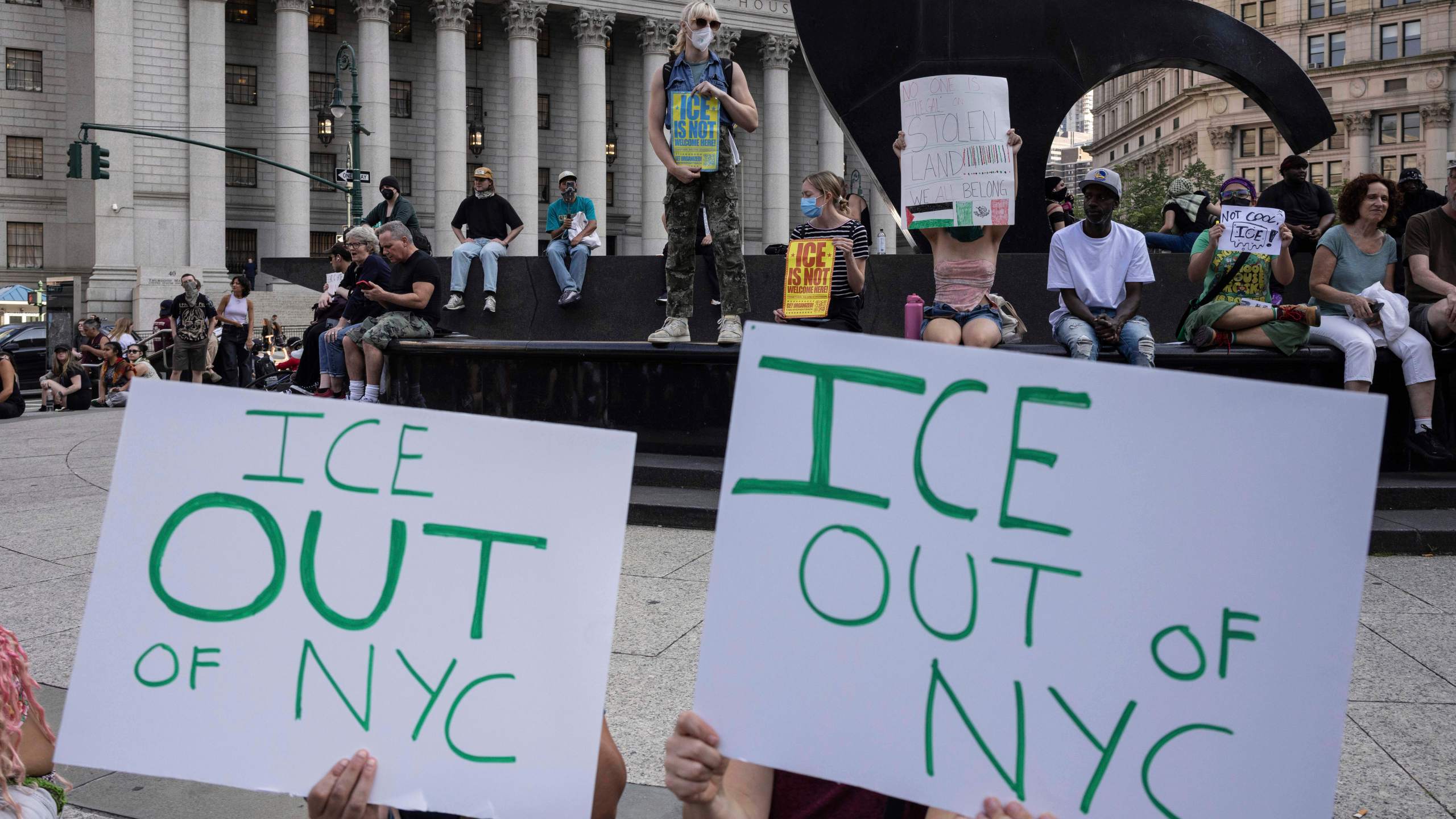 Demonstrators hold signs and chant during a protest against deportation by Immigration and Customs Enforcement in New York, Wednesday, June 11, 2025. (AP Photo/Yuki Iwamura)