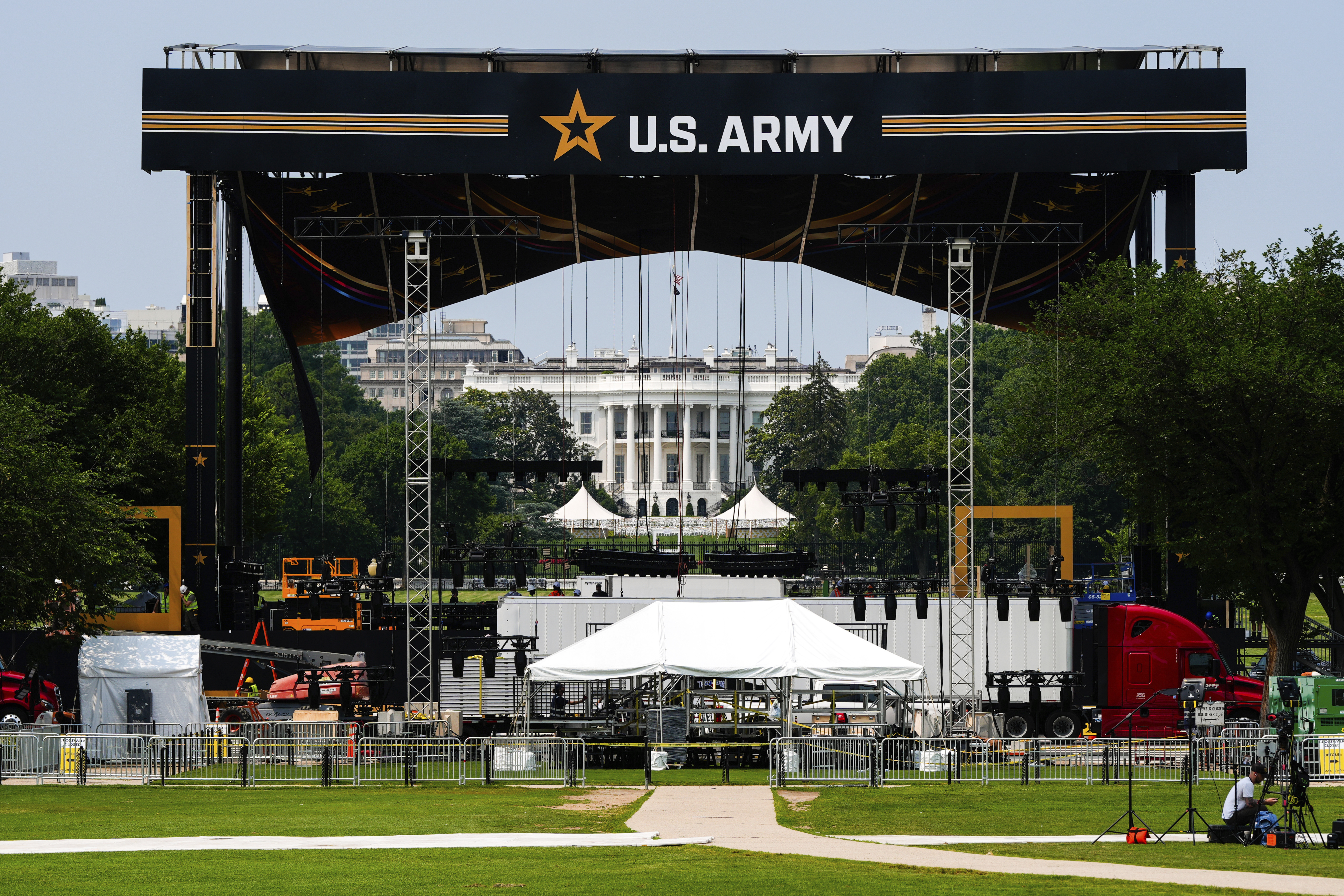 The White House is seen beyond a stage ahead of an upcoming military parade commemorating the Army's 250th anniversary and coinciding with Donald Trump's 79th birthday, Wednesday, June 11, 2025, in Washington (AP Photo/Julia Demaree Nikhinson)