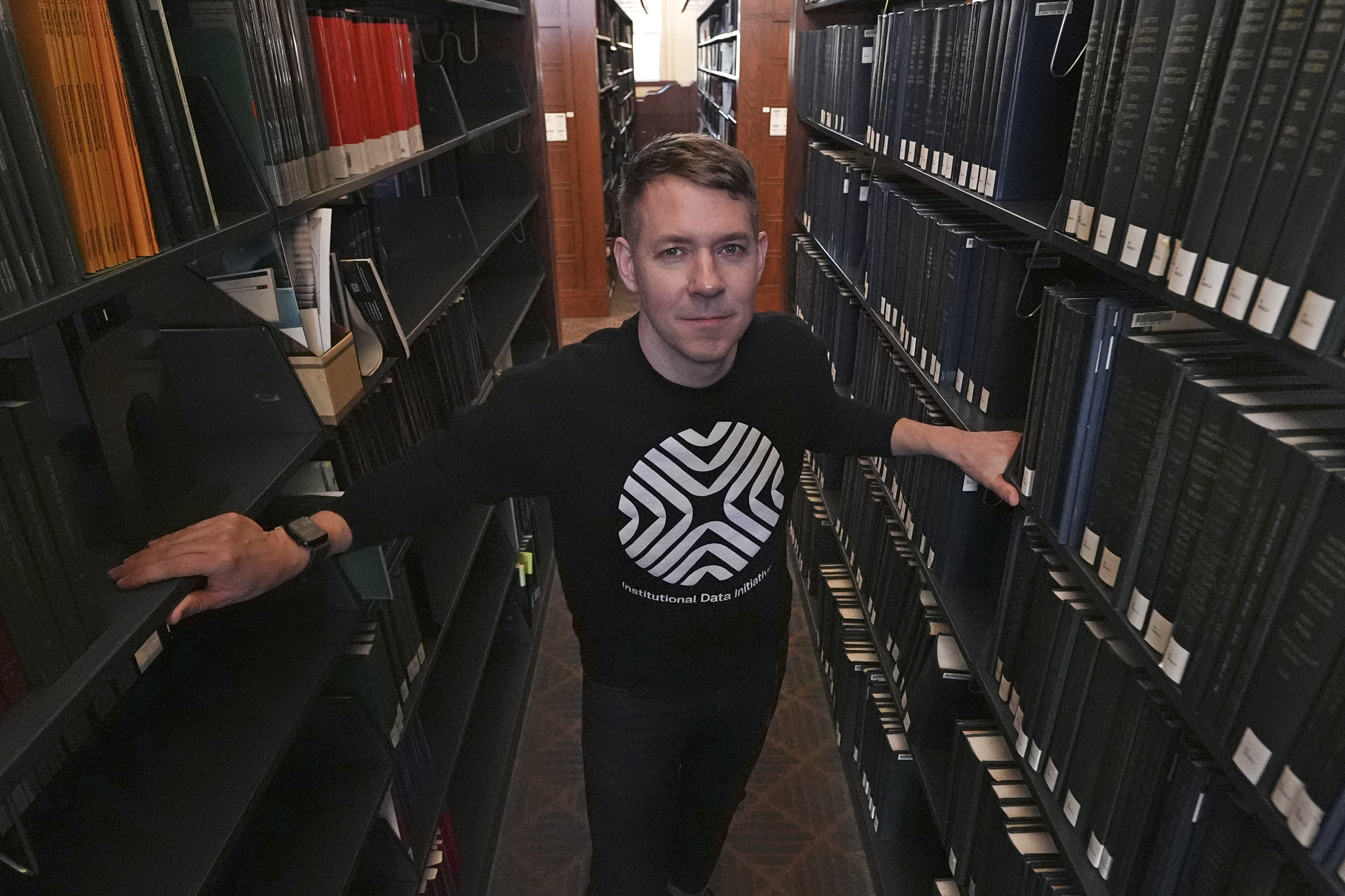 Greg Leppert, executive director at the Institutional Data Initiative, poses at Langdell Hall, which houses the Harvard Law School library, Wednesday, Feb. 26, 2025, in Cambridge, Mass. (AP Photo/Charles Krupa)