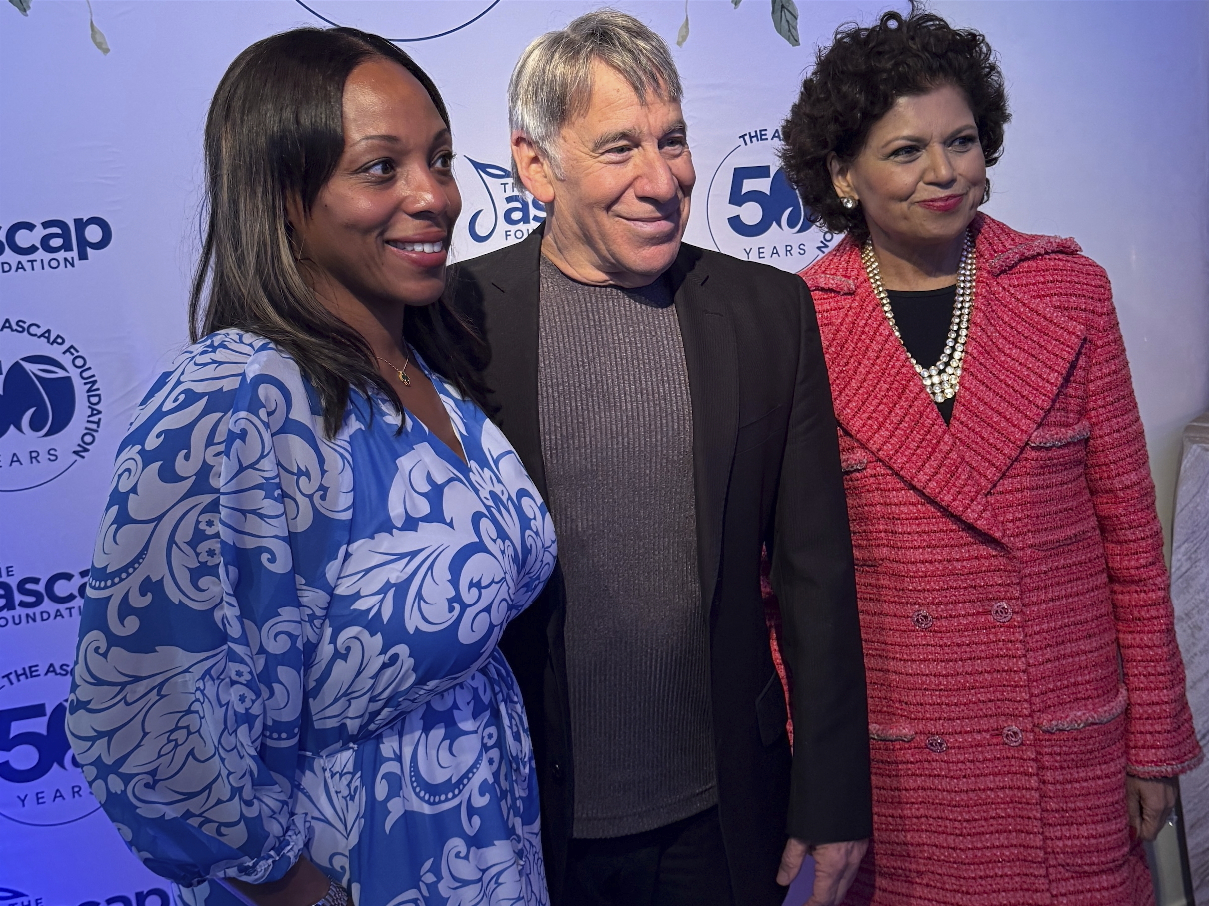ASCAP Foundation Executive Director Nicole George-Middleton, Stephen Schwartz and businesswoman Chandrika Tandon pose for a photo at the ASCAP Foundation's 50th anniversary celebration in Manhattan, New York on Tuesday, June 10, 2025. (AP Photo/James Pollard)
