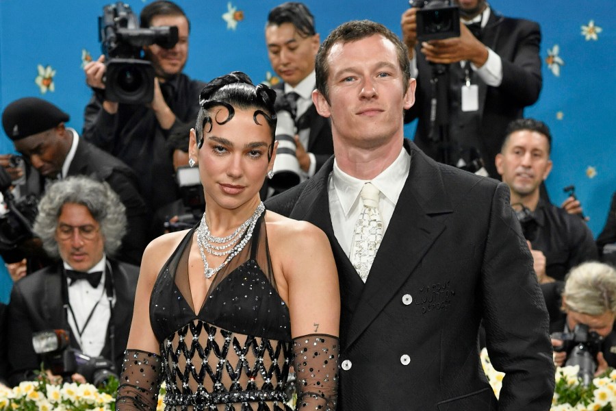 FILE - Dua Lipa, left, and Callum Turner attend The Metropolitan Museum of Art's Costume Institute benefit gala on May 5, 2025, in New York. (Photo by Evan Agostini/Invision/AP, File)