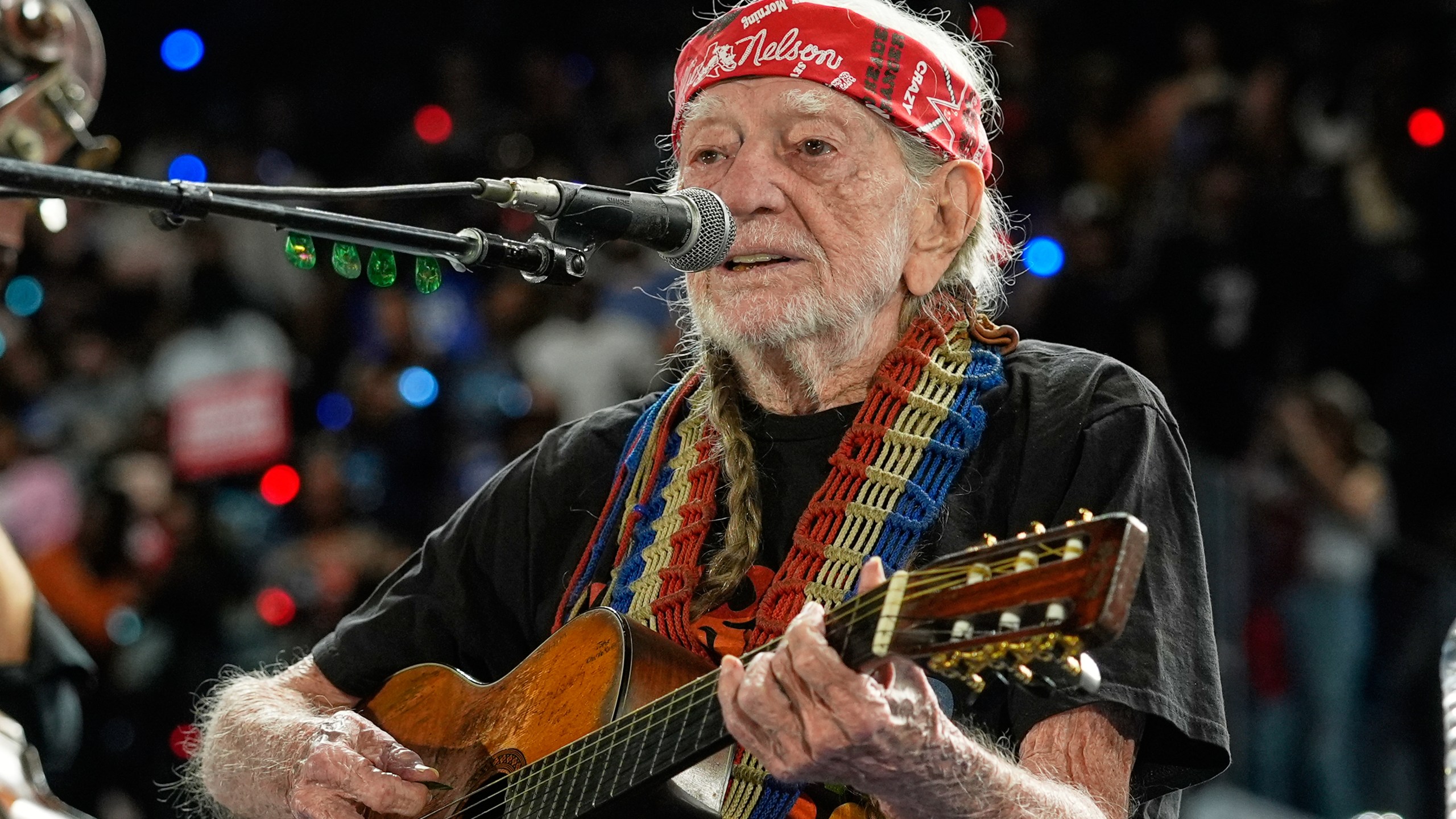 FILE - Musician Willie Nelson performing ahead of event for Democratic presidential nominee Vice President Kamala Harris at a rally in Houston, Friday, Oct. 25, 2024. (AP Photo/Susan Walsh, File)