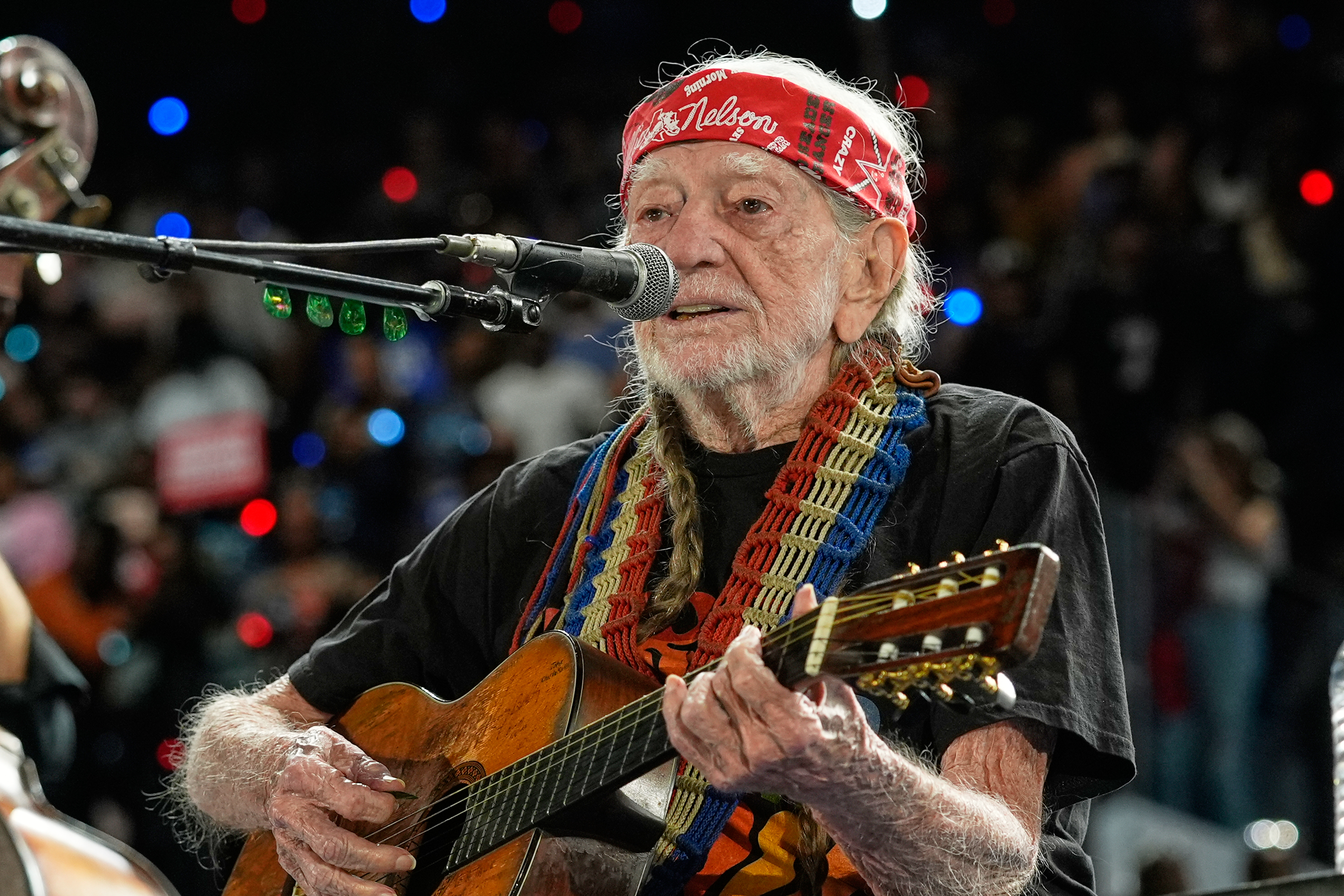 FILE - Musician Willie Nelson performing ahead of event for Democratic presidential nominee Vice President Kamala Harris at a rally in Houston, Friday, Oct. 25, 2024. (AP Photo/Susan Walsh, File)