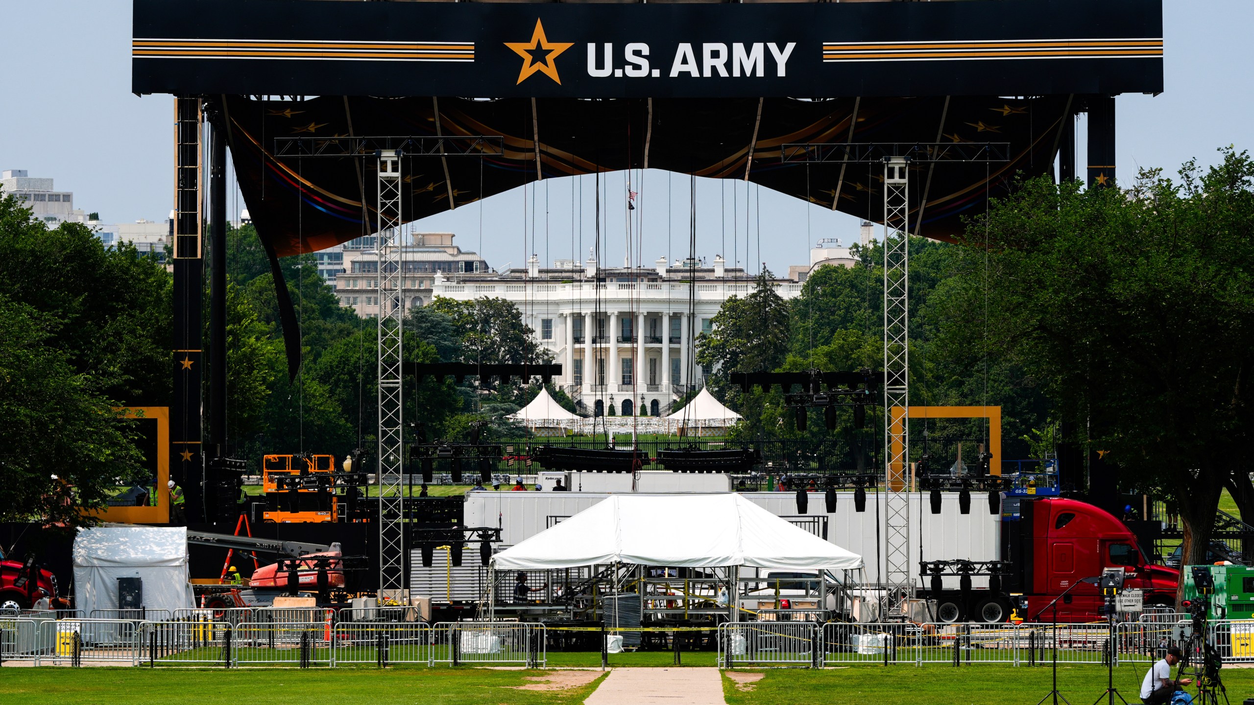 The White House is seen beyond a stage ahead of an upcoming military parade commemorating the Army's 250th anniversary and coinciding with Donald Trump's 79th birthday, Wednesday, June 11, 2025, in Washington (AP Photo/Julia Demaree Nikhinson)