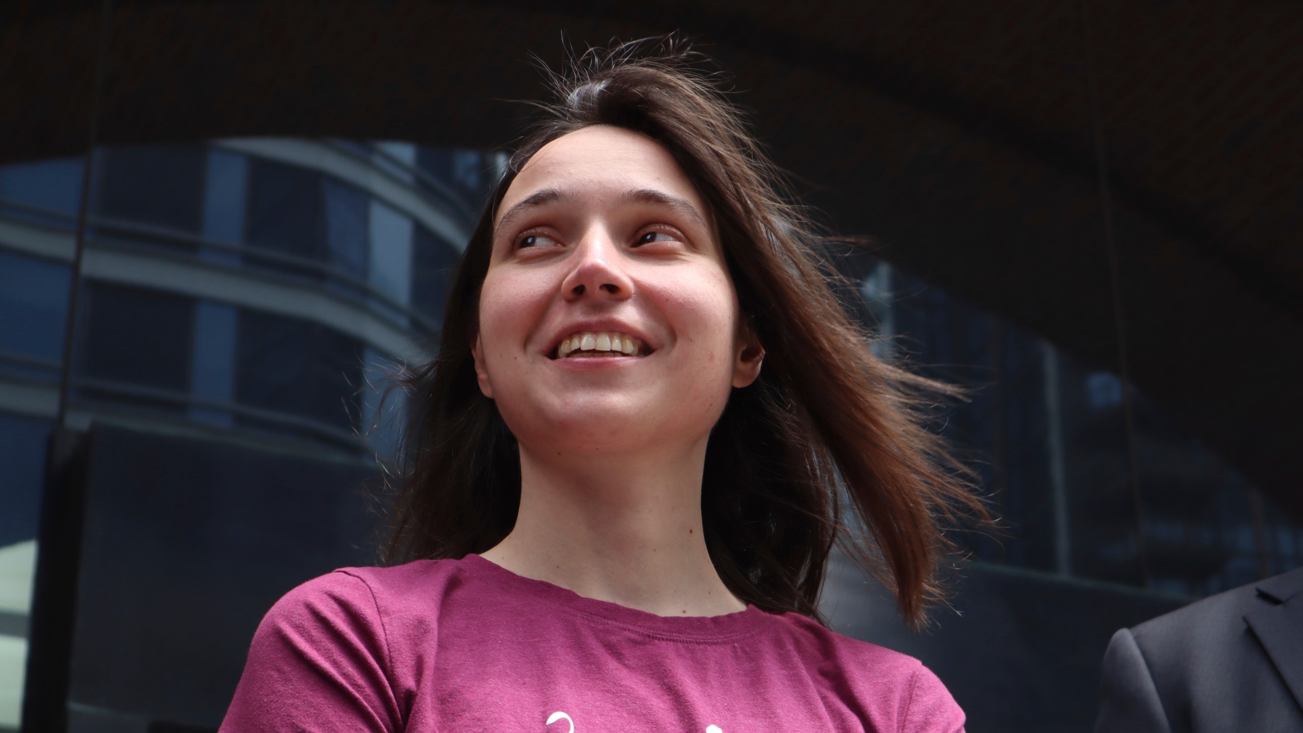 Kseniia Petrova, 30, smiles after being released on bail from federal custody at the John Joseph Moakley United States Courthouse on Thursday, June 12, 2025, in Boston. (AP Photo/Leah Willingham)
