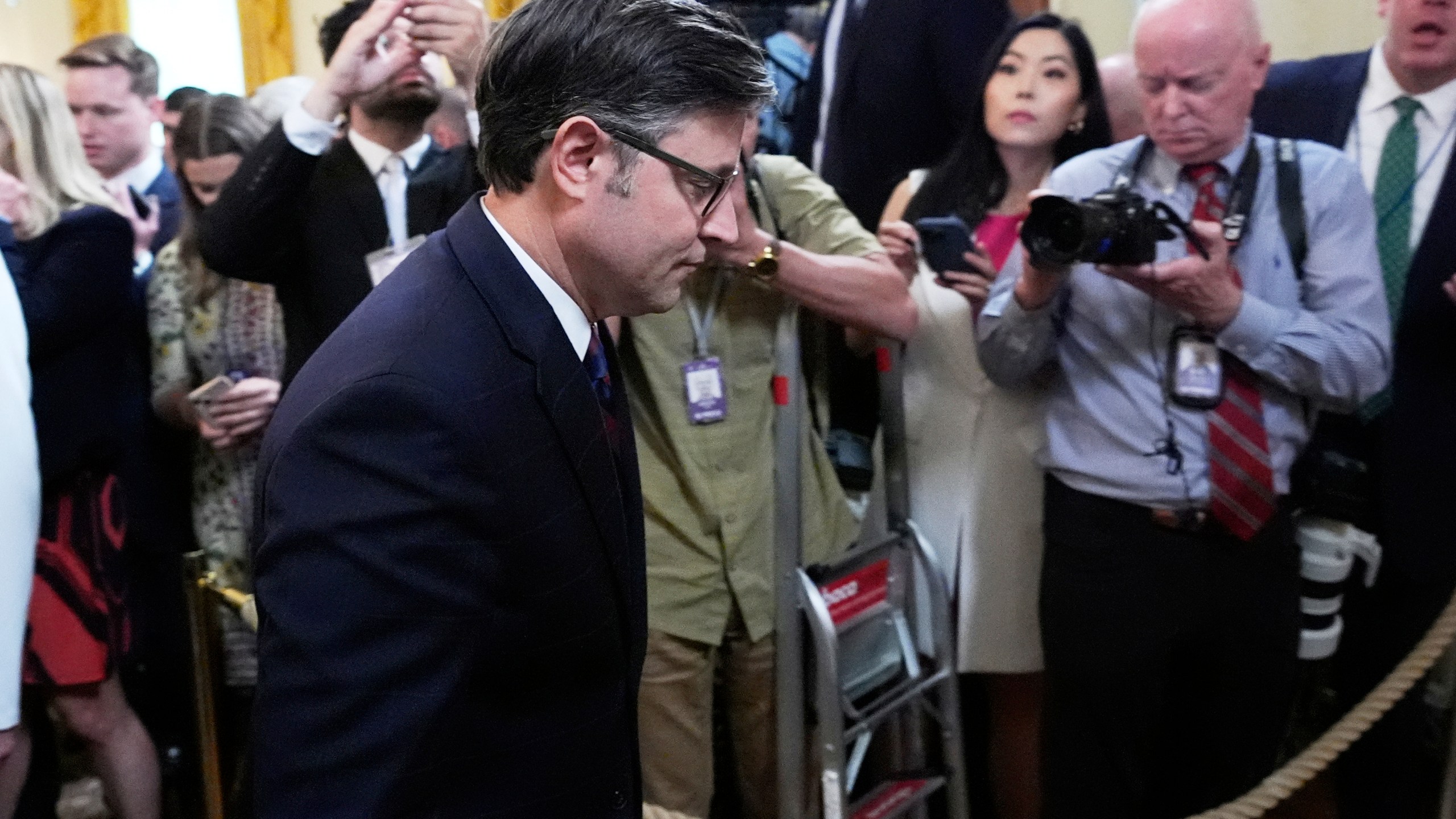 House Speaker Mike Johnson, R-La., departs after President Donald Trump signed a bill blocking California's rule banning the sale of new gas-powered cars by 2035, at an event in the East Room of the White House, Thursday, June 12, 2025, in Washington. (AP Photo/Alex Brandon)