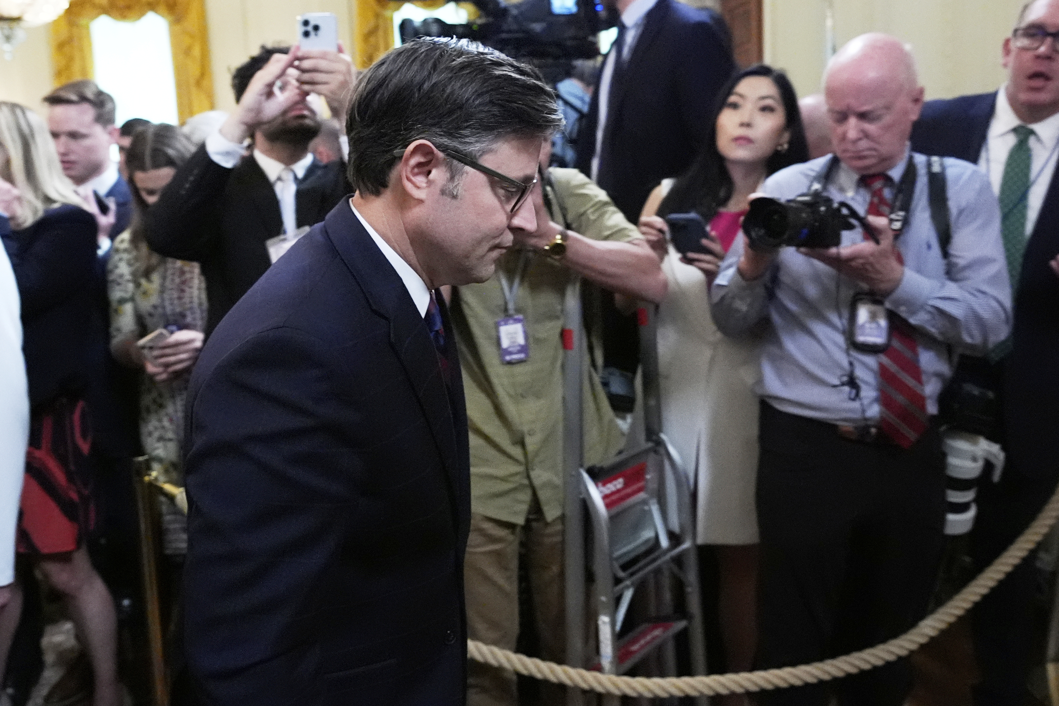 House Speaker Mike Johnson, R-La., departs after President Donald Trump signed a bill blocking California's rule banning the sale of new gas-powered cars by 2035, at an event in the East Room of the White House, Thursday, June 12, 2025, in Washington. (AP Photo/Alex Brandon)