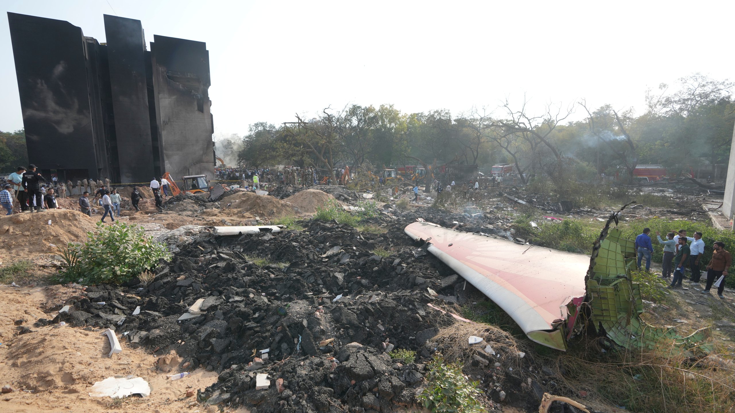 The debris of an airplane lie scattered after it crashed in India's northwestern city of Ahmedabad in Gujarat state, Thursday, June 12, 2025. (AP Photo/Ajit Solanki)