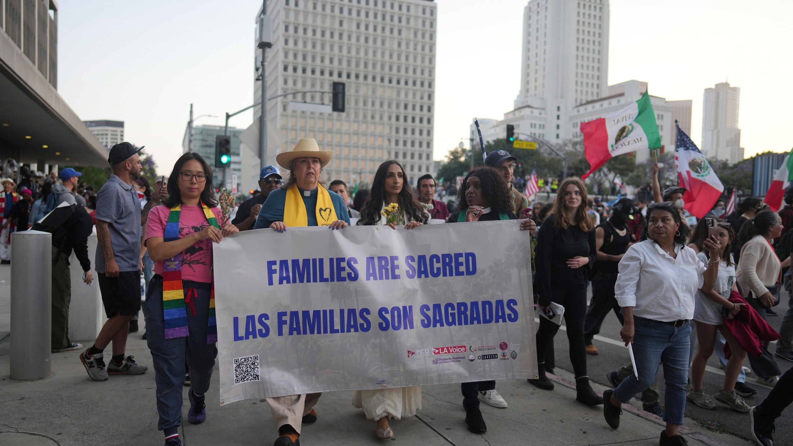 Demonstrators march during a protest Tuesday, June 10, 2025, in Los Angeles. (AP Photo/Eric Thayer)