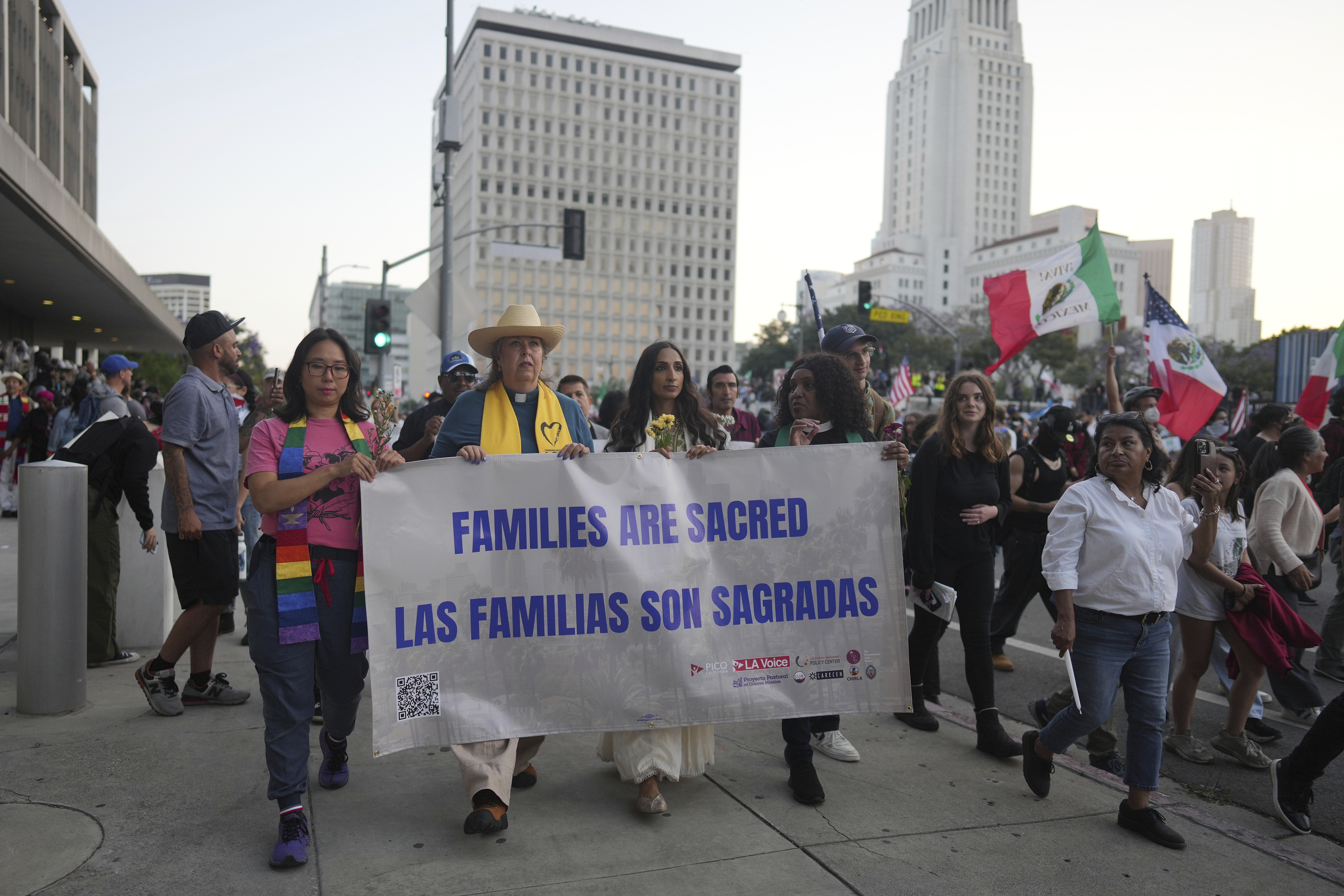 Demonstrators march during a protest Tuesday, June 10, 2025, in Los Angeles. (AP Photo/Eric Thayer)