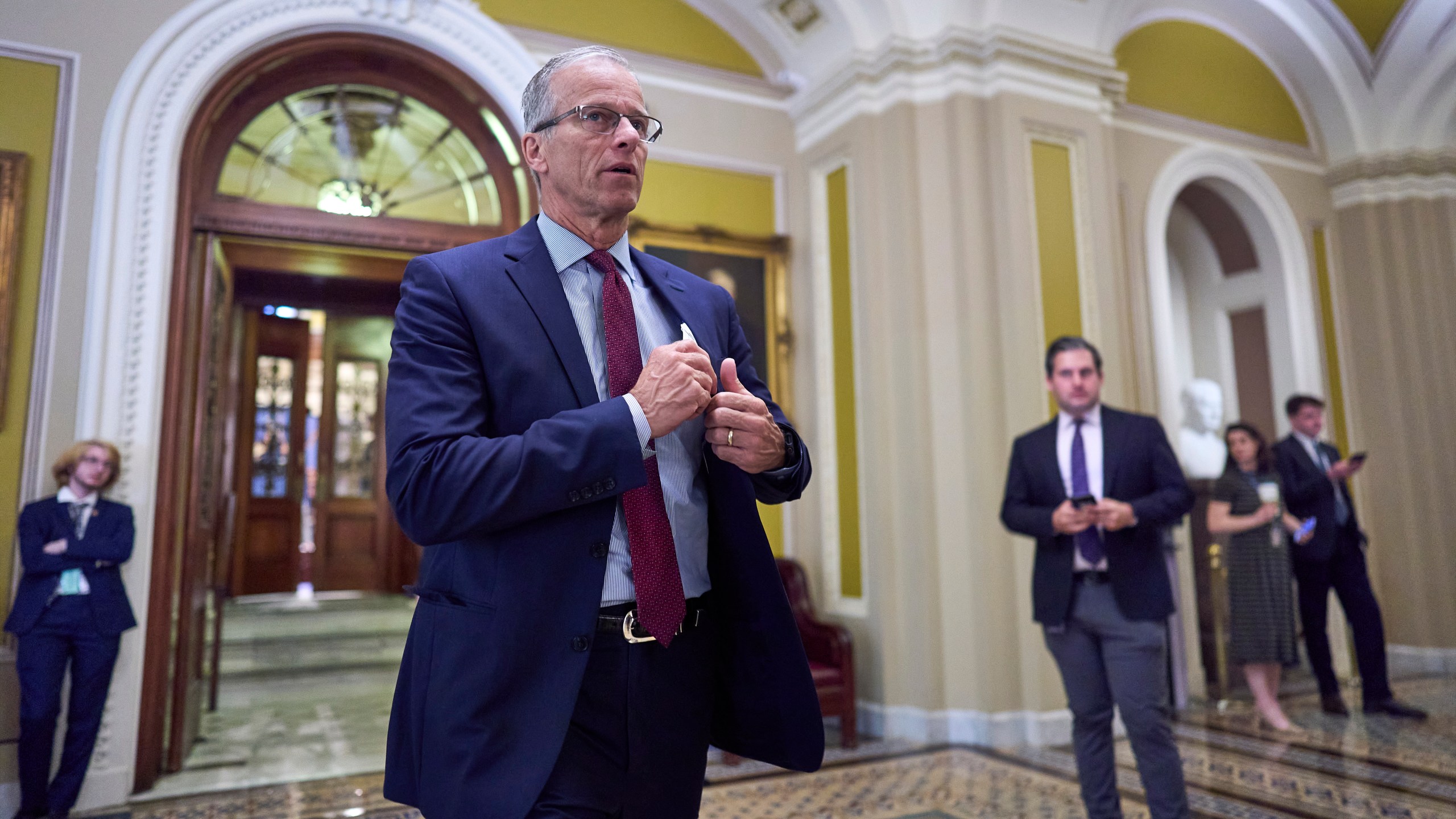 Senate Majority Leader John Thune, R-S.D., leaves the chamber as Republican senators meet to find a way to help President Donald Trump cancel $9.4 billion in spending already approved by Congress, at the Capitol in Washington, Wednesday, June 11, 2025. (AP Photo/J. Scott Applewhite)