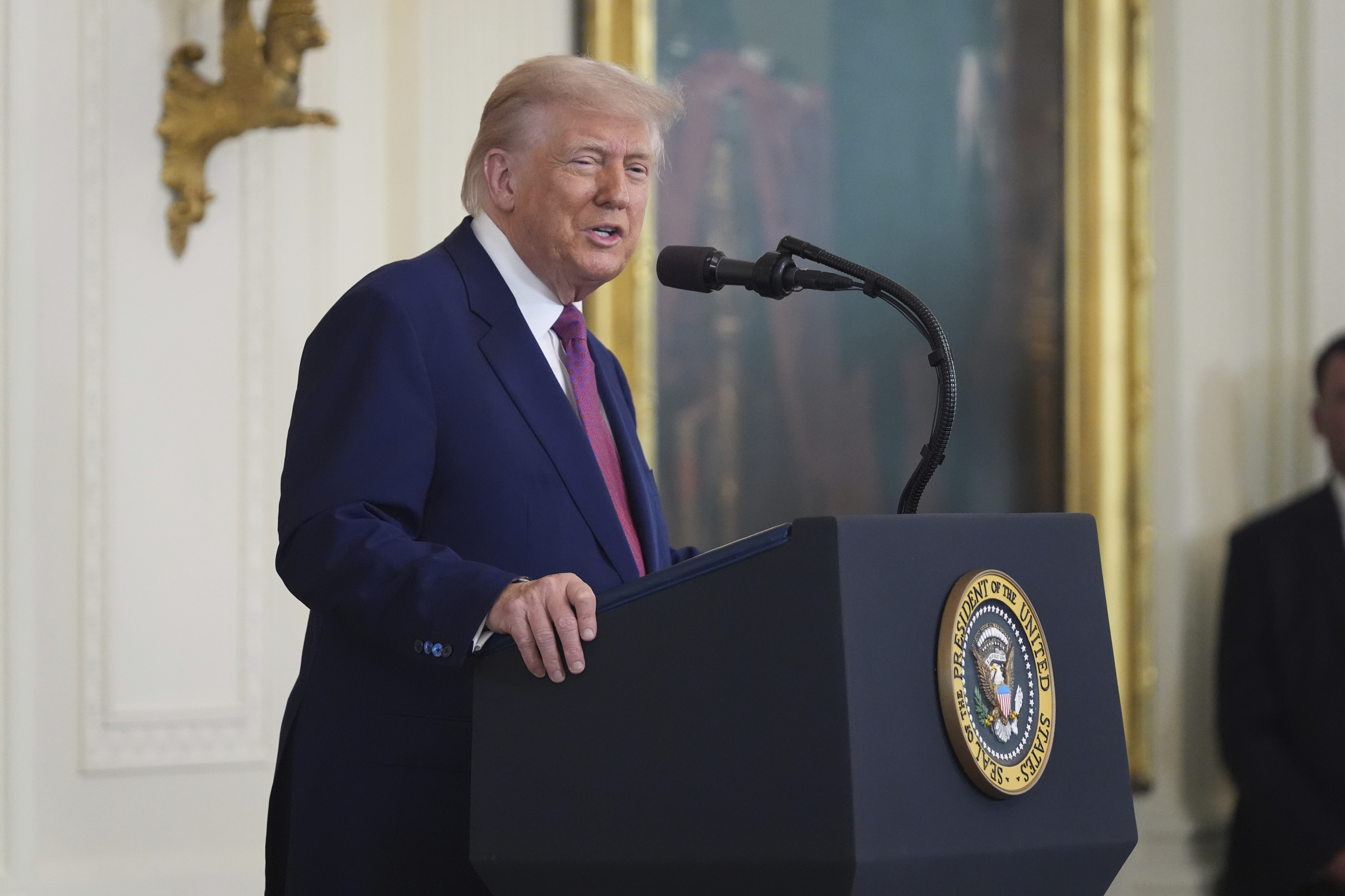 President Donald Trump speaks during an event to sign a bill blocking California's rule banning the sale of new gas-powered cars by 2035 in the East Room of the White House, Thursday, June 12, 2025, in Washington. (AP Photo/Evan Vucci)