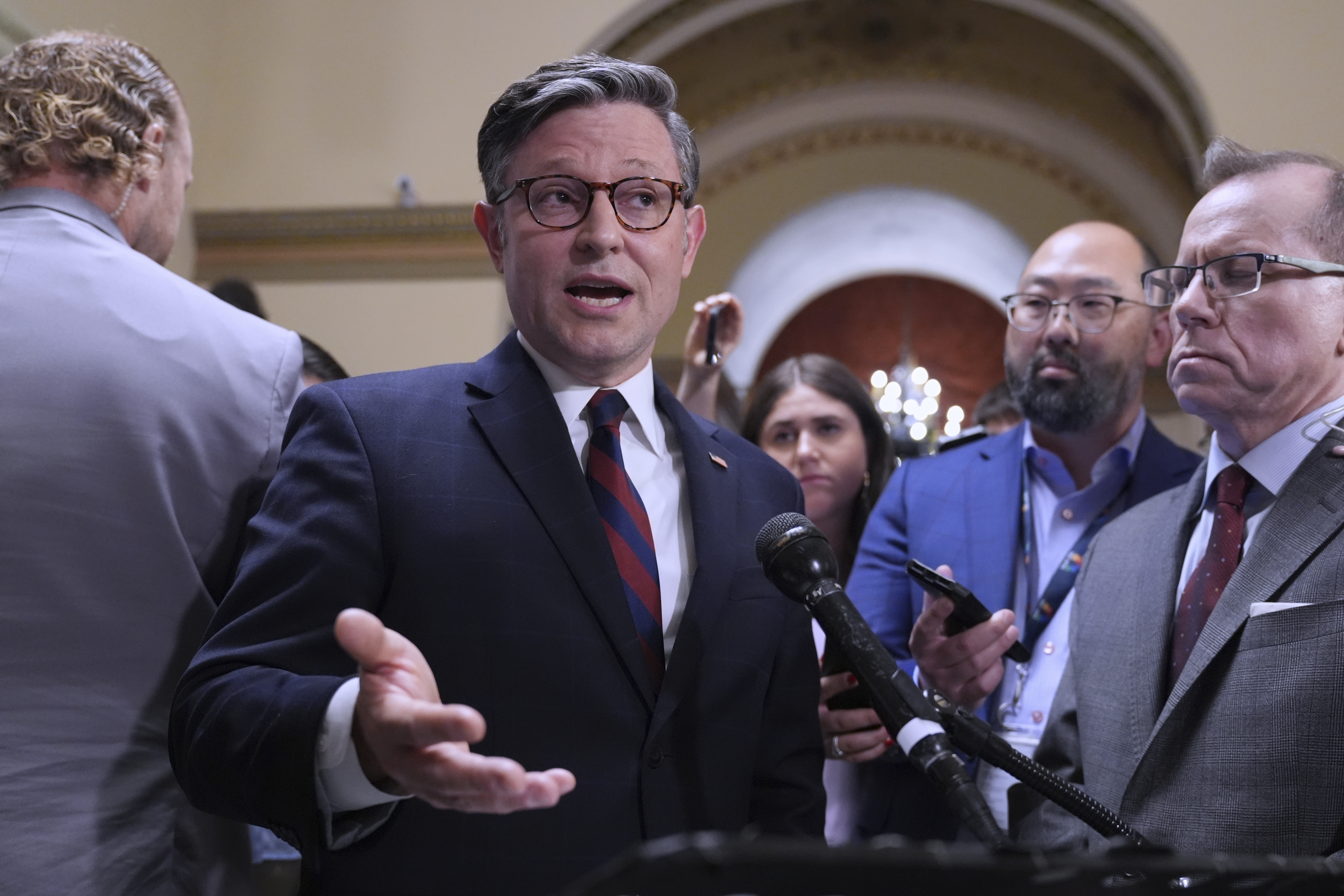 Speaker of the House Mike Johnson, R-La., reacts to reporters after Sen. Alex Padilla, D-Calif., was forcefully removed from Homeland Security Secretary Kristi Noem's news conference in Los Angeles and handcuffed by officers as he tried to speak up about immigration raids that have led to protests in California and elsewhere, at the Capitol in Washington, Thursday, June 12, 2025. (AP Photo/J. Scott Applewhite)