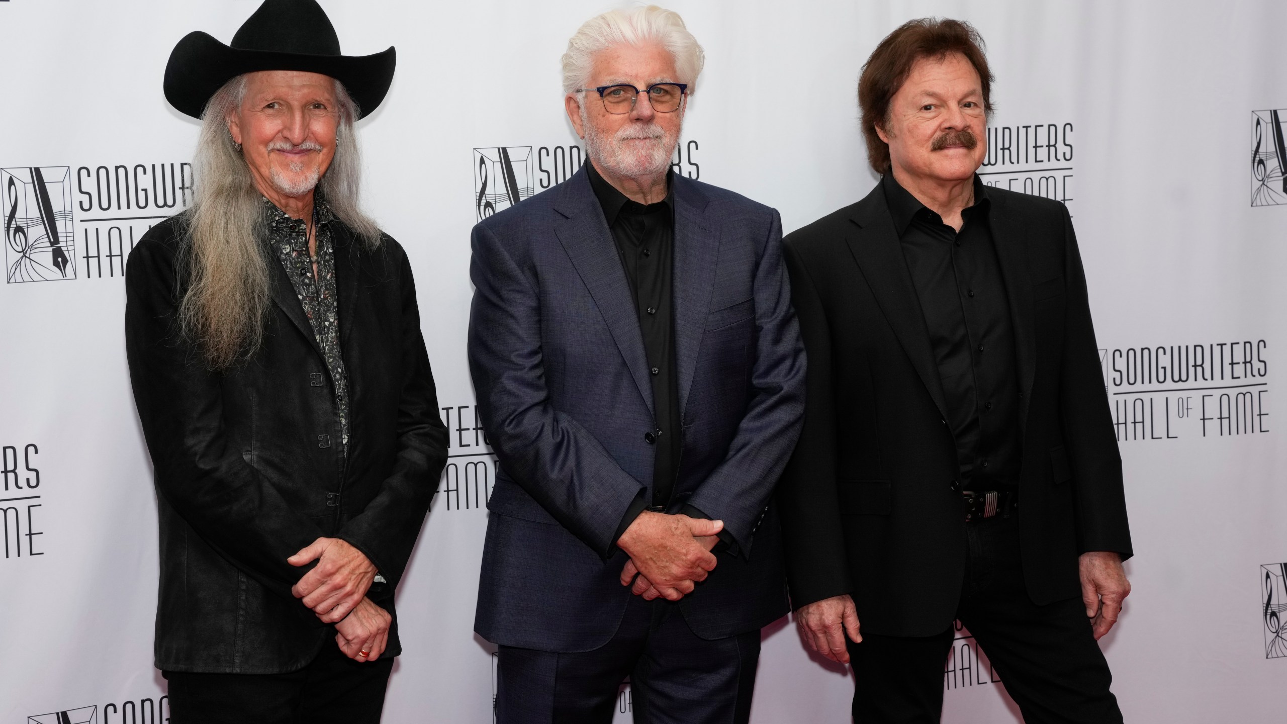 Patrick Simmons, Michael McDonald, Tom Johnston of the Doobie Brothers attend the 54th annual Songwriters Hall of Fame induction and awards gala on Thursday, June 12, 2025, at the Marriott Marquis Hotel in New York. (Photo by Charles Sykes/Invision/AP)