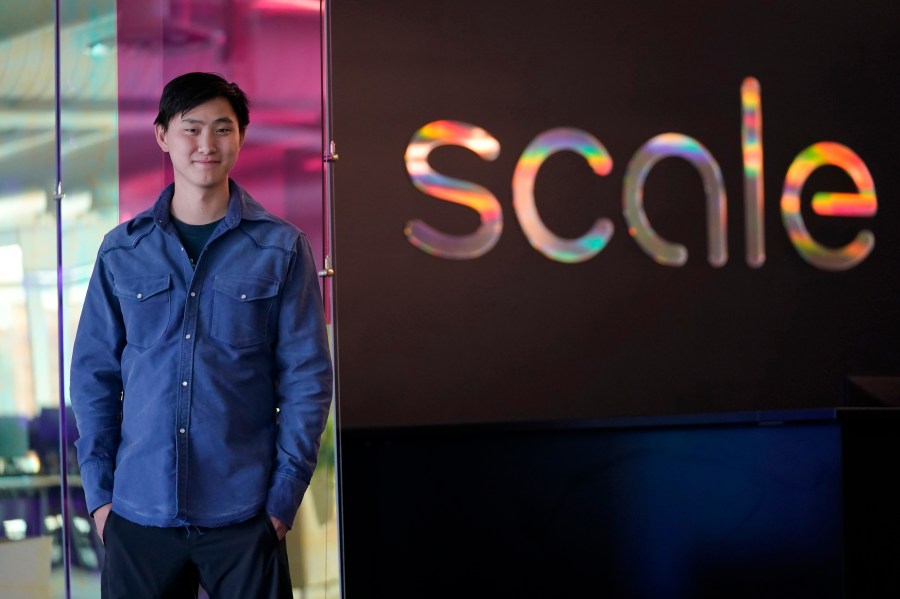 FILE - Scale AI founder and CEO Alexandr Wang poses for photos at the company's office in San Francisco, May 15, 2023. (AP Photo/Jeff Chiu, File)