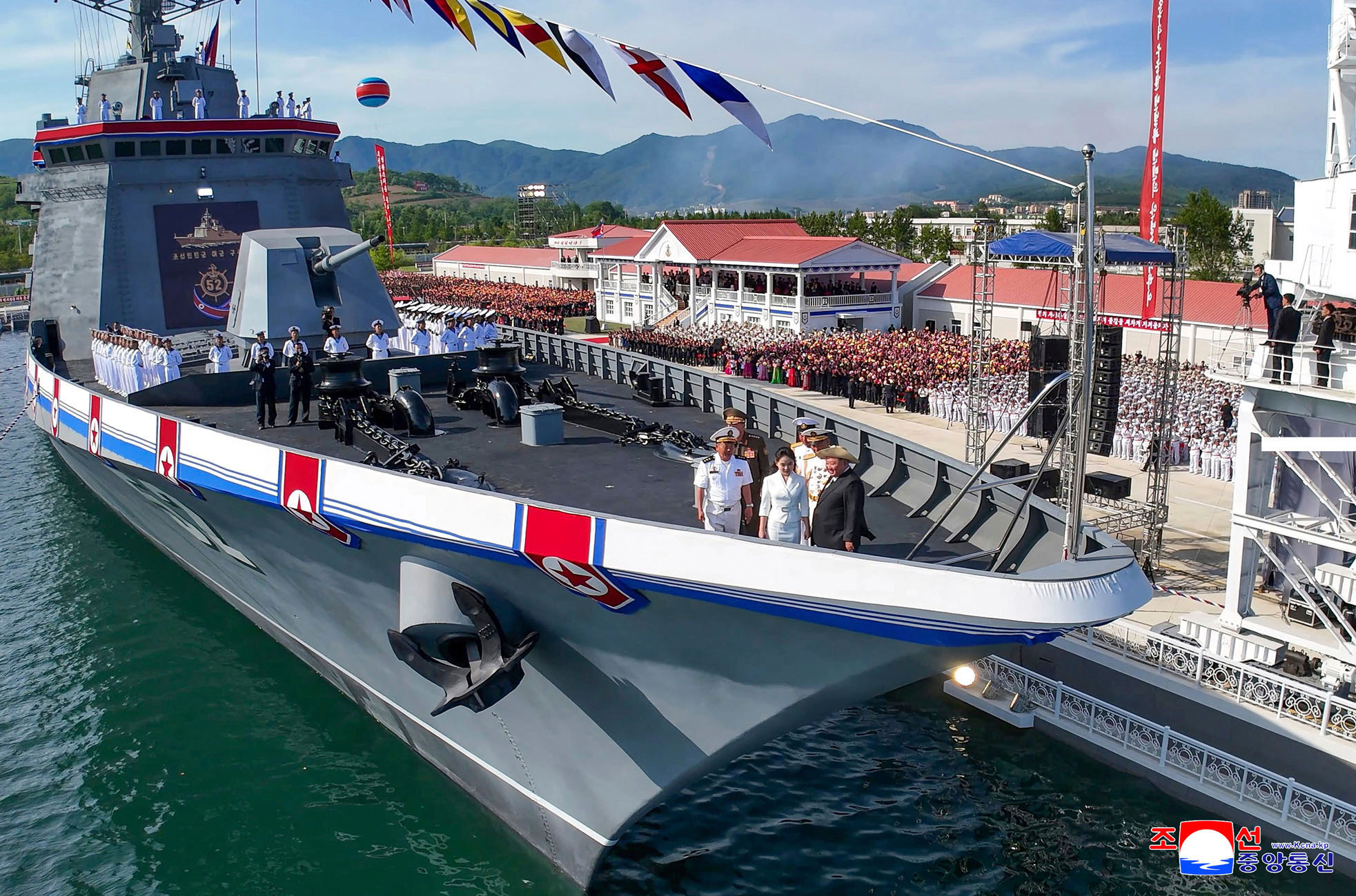 In this photo provided by the North Korean government, its leader Kim Jong Un, front right, and his daughter stand on a destroyer named Kang Kon during its launch ceremony at the Rajin shipyard in Rason, North Korea, Thursday, June 12, 2025. Independent journalists were not given access to cover the event depicted in this image distributed by the North Korean government. The content of this image is as provided and cannot be independently verified. Korean language watermark on image as provided by source reads: "KCNA" which is the abbreviation for Korean Central News Agency. (Korean Central News Agency/Korea News Service via AP)
