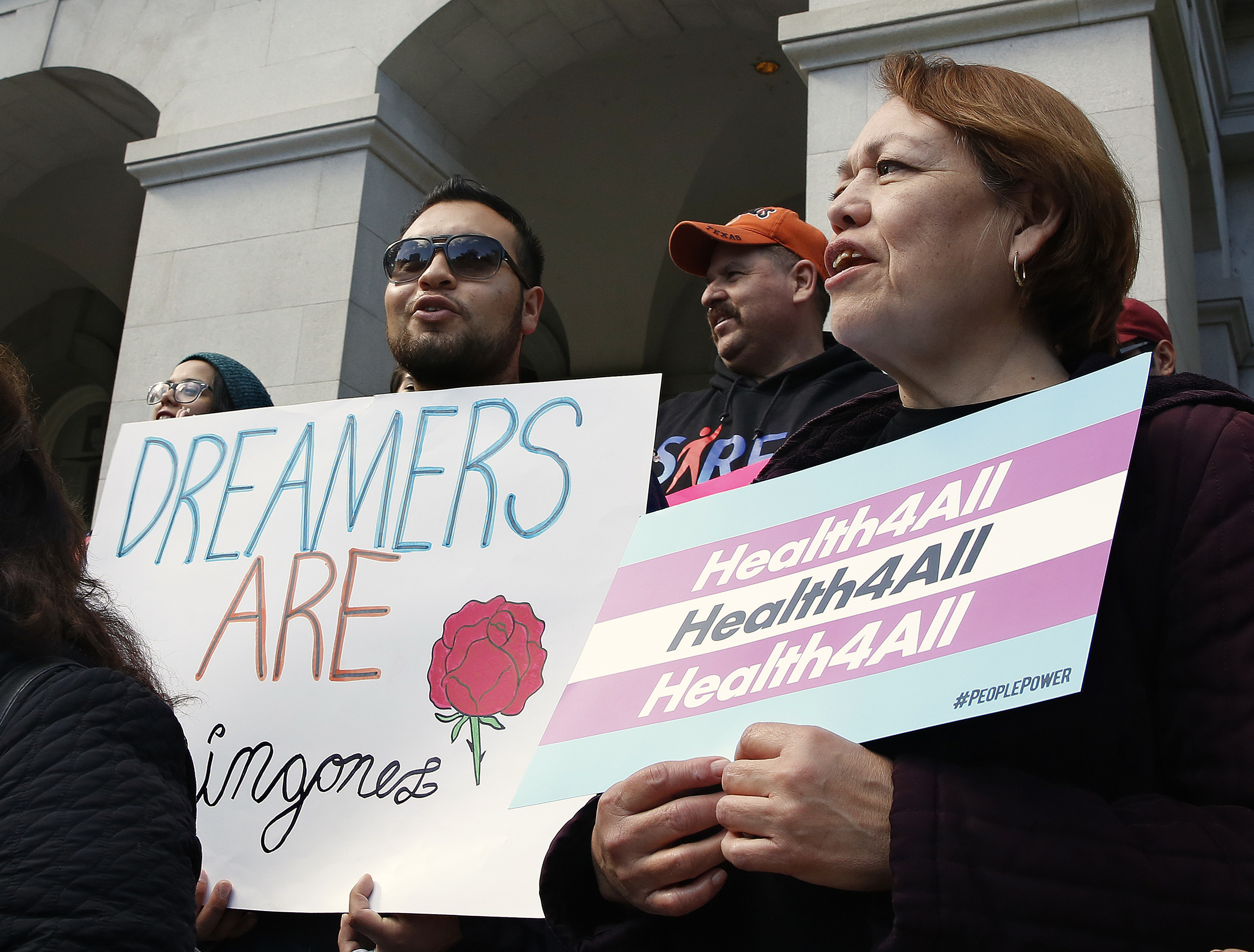 FILE - Supporters of proposals to expand California's government-funded health care benefits to undocumented immigrants gather at the Capitol for the Immigrants Day of Action, on May 20, 2019, in Sacramento, Calif. (AP Photo/Rich Pedroncelli, File)