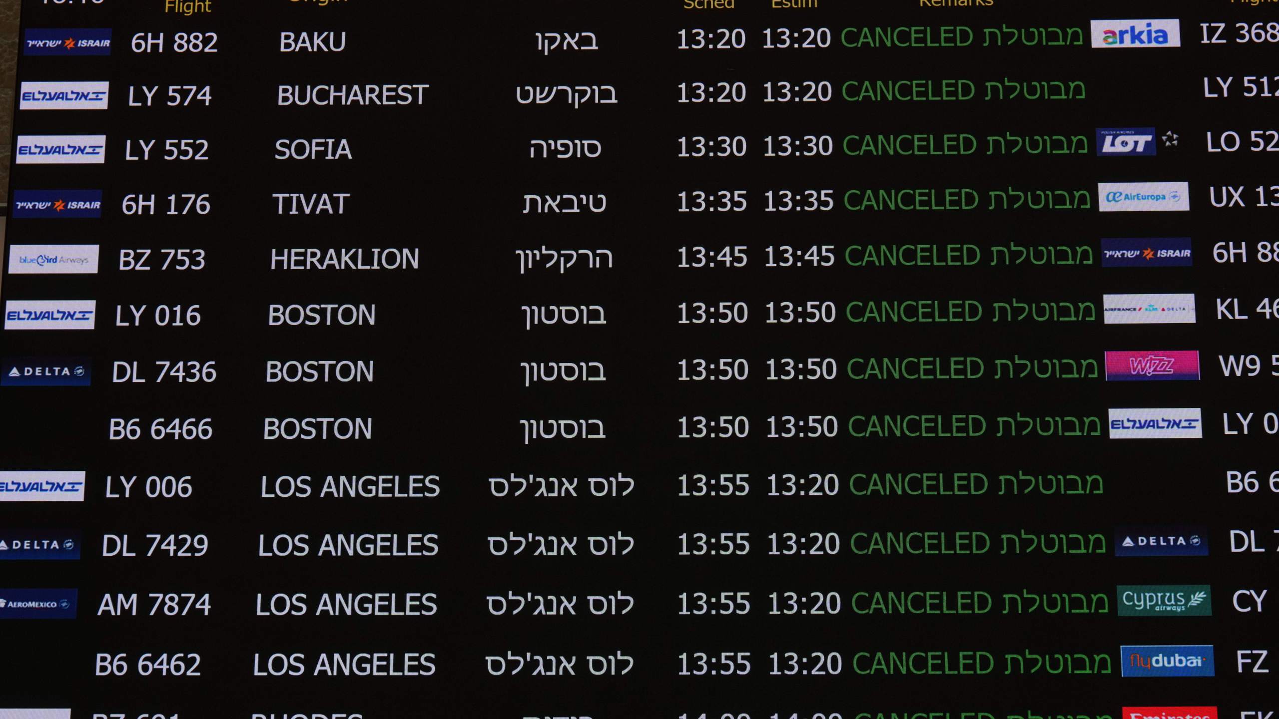 The flight information board at Israel's Ben Gurion Airport shows flight cancellations following an Israeli military strike on Iran, near Tel Aviv, Israel, Friday, June 13, 2025. (AP Photo/Ariel Schalit)