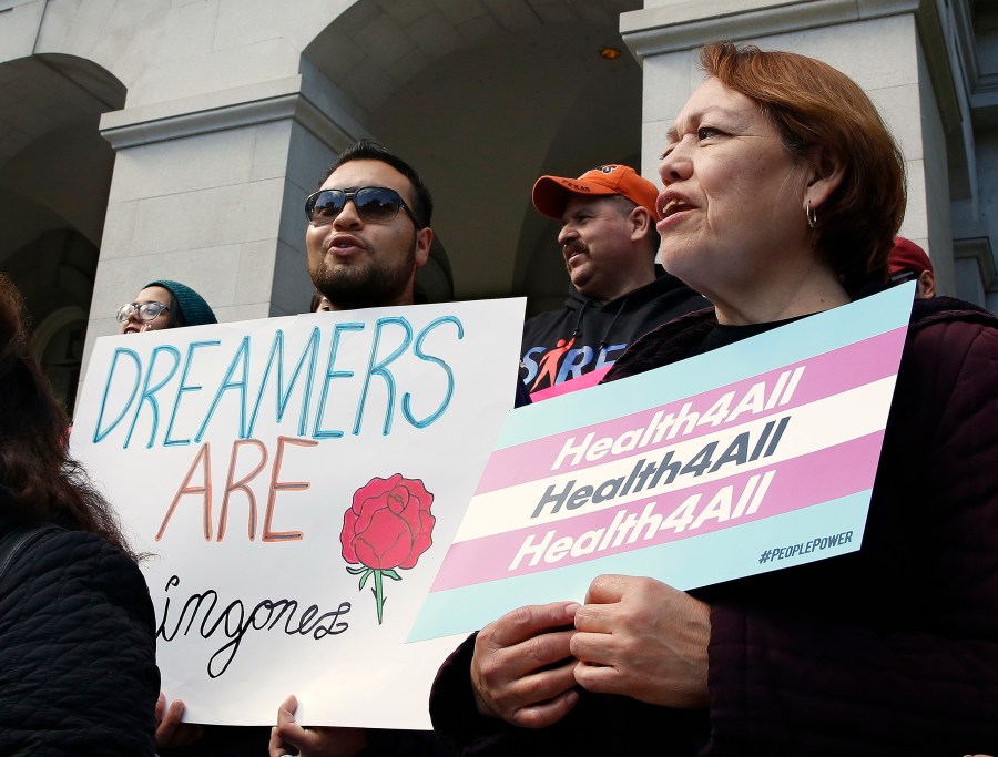 FILE - Supporters of proposals to expand California's government-funded health care benefits to undocumented immigrants gather at the Capitol for the Immigrants Day of Action, on May 20, 2019, in Sacramento, Calif. (AP Photo/Rich Pedroncelli, File)