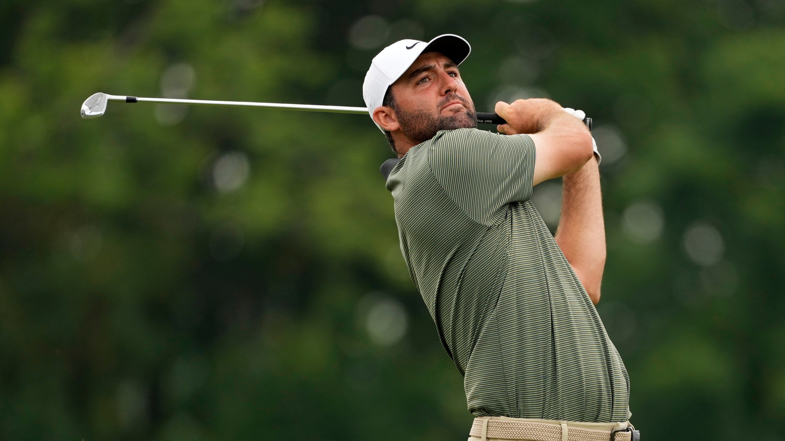 Scottie Scheffler tees off on the 16th hole during the second round of the U.S. Open golf tournament at Oakmont Country Club Friday, June 13, 2025, in Oakmont, Pa. (AP Photo/Carolyn Kaster)