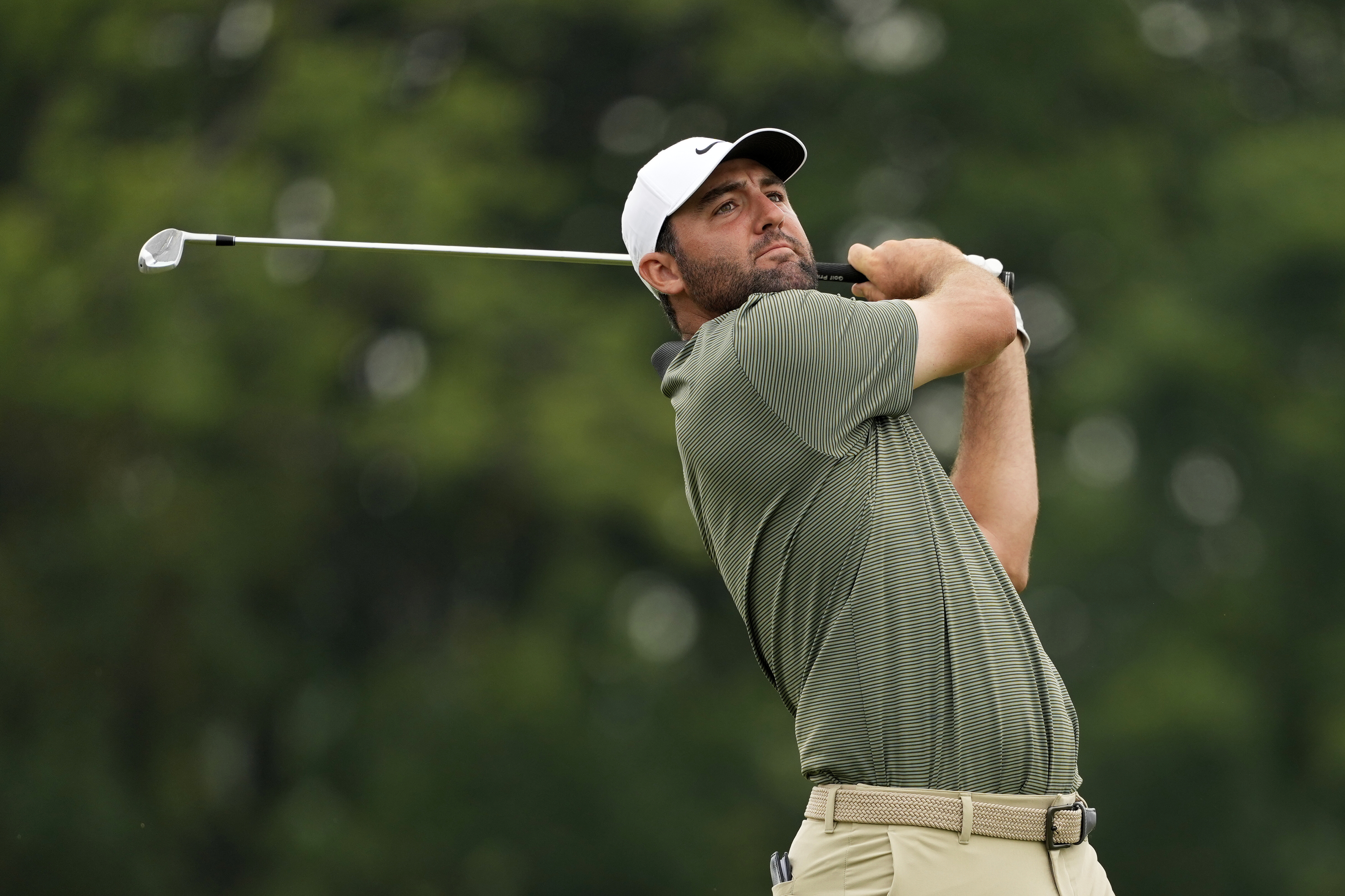 Scottie Scheffler tees off on the 16th hole during the second round of the U.S. Open golf tournament at Oakmont Country Club Friday, June 13, 2025, in Oakmont, Pa. (AP Photo/Carolyn Kaster)