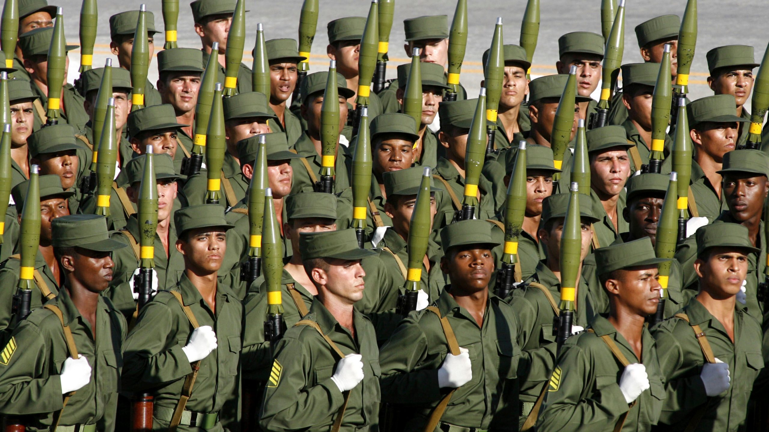 FILE - Cuban soldiers march during a military parade along the Revolution Square in Havana, Cuba, Dec. 2, 2006. (AP Photo/ Javier Galeano, File)
