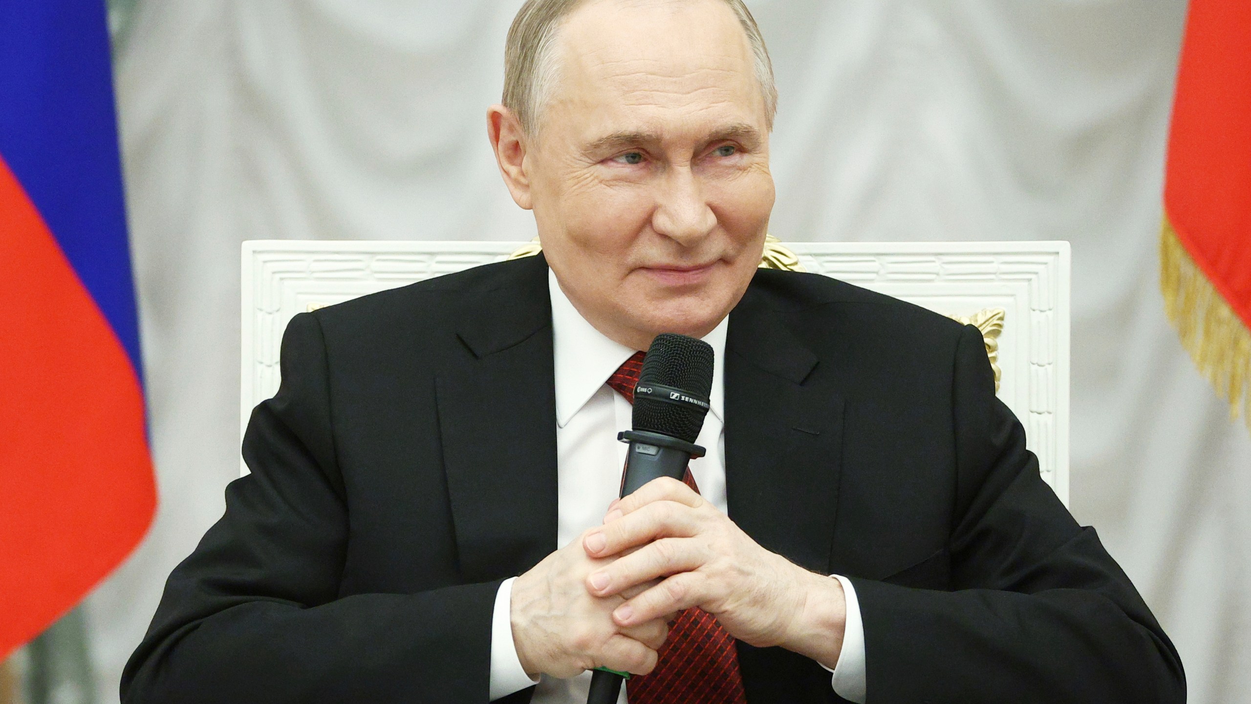 Russian President Vladimir Putin speaks with participants of the Time of Heroes, an educational program for veterans of special military operation, at the Kremlin in Moscow, Russia, Thursday, June 12, 2025. (Sergei Bulkin, Sputnik, Kremlin Pool Photo via AP)