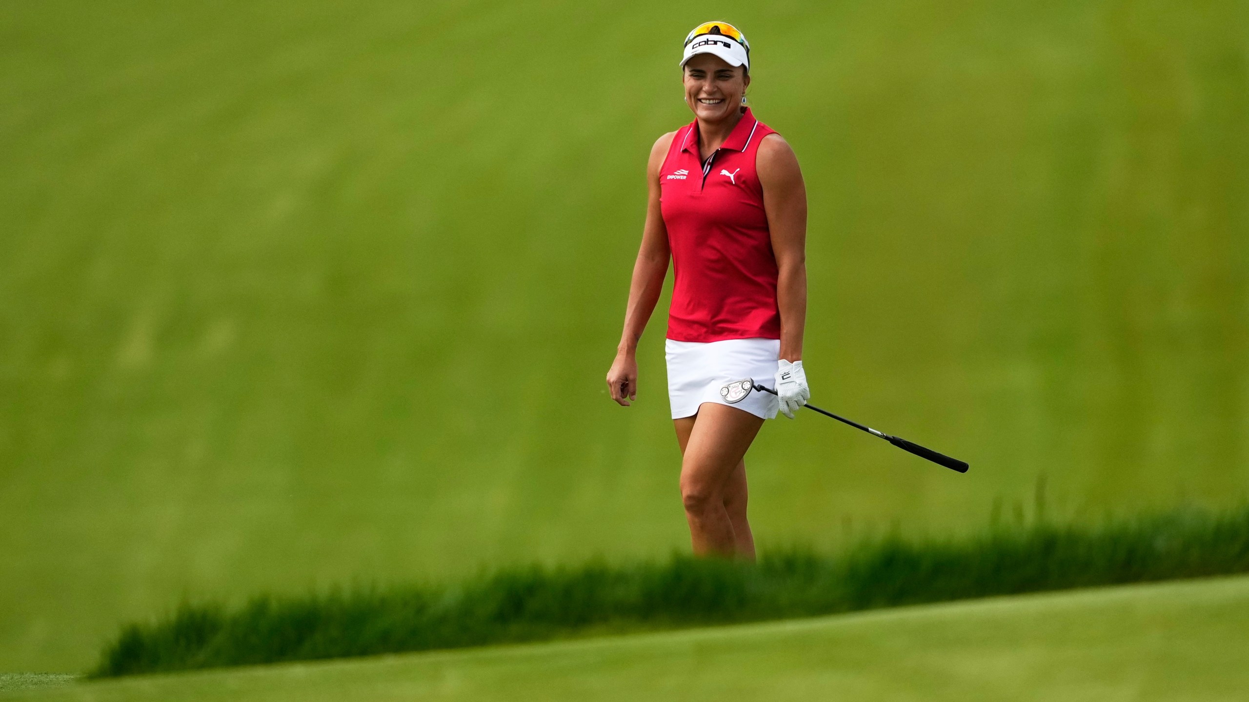 Lexi Thompson smiles on the 11th hole during the first round of the U.S. Women's Open golf tournament at Erin Hills Thursday, May 29, 2025, in Erin, Wis. (AP Photo/Matt York)