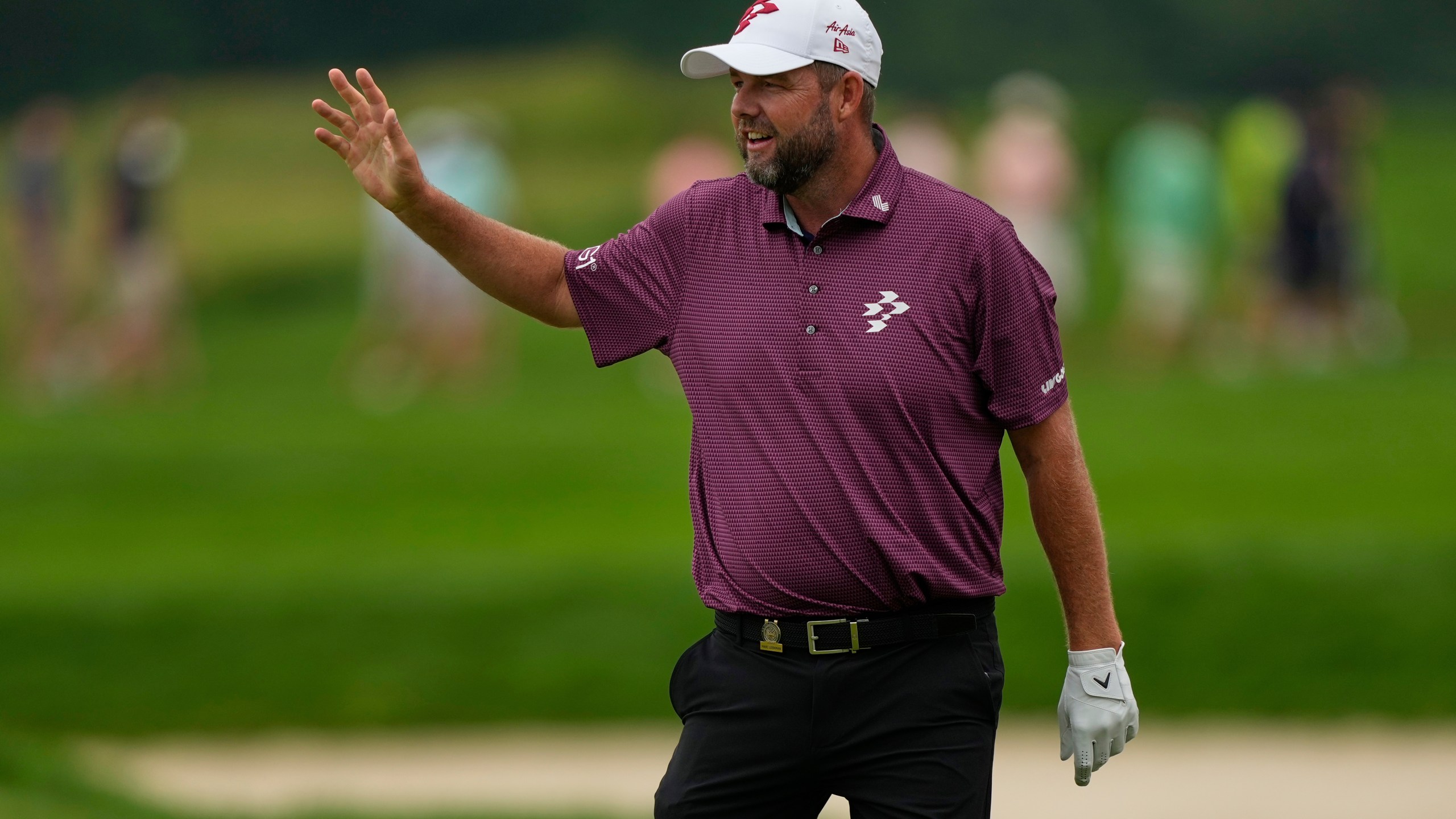 Marc Leishman, of Australia, celebrates after making birdie on the eighth hole during the third round of the U.S. Open golf tournament at Oakmont Country Club Saturday, June 14, 2025, in Oakmont, Pa. (AP Photo/Carolyn Kaster)