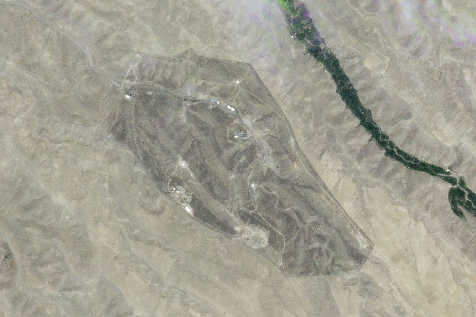 This satellite image from Planet Labs PBC shows an Iranian missile base near Tabriz, Iran, after an Israeli strike Friday, June 13, 2025. (Planet Labs PBC via AP)