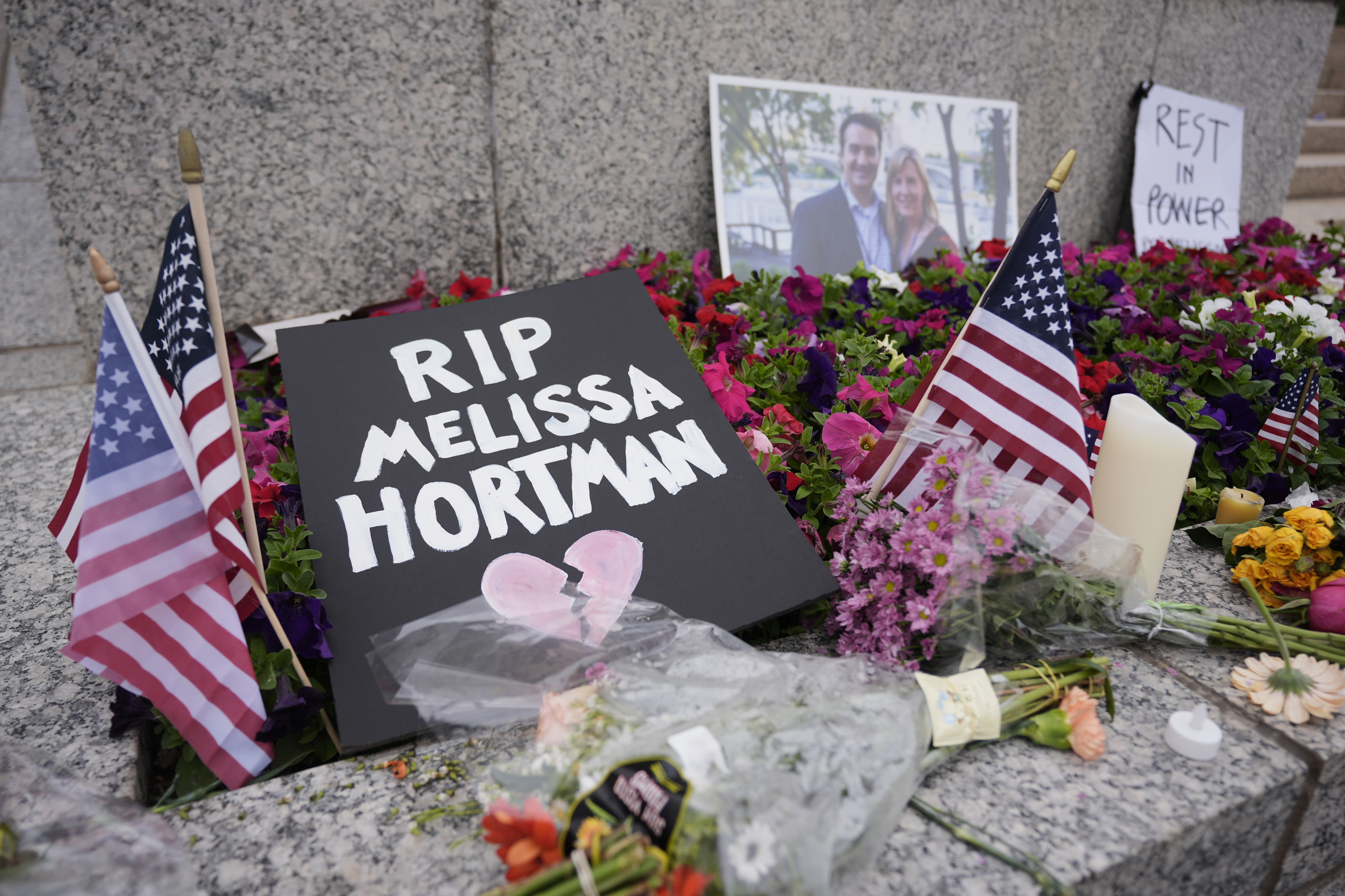 A makeshift memorial for Minnesota state Rep. Melissa Hortman and her husband Mark is seen at the state Capitol, Sunday, June 15, 2025, in St. Paul, Minn. (AP Photo/George Walker IV)