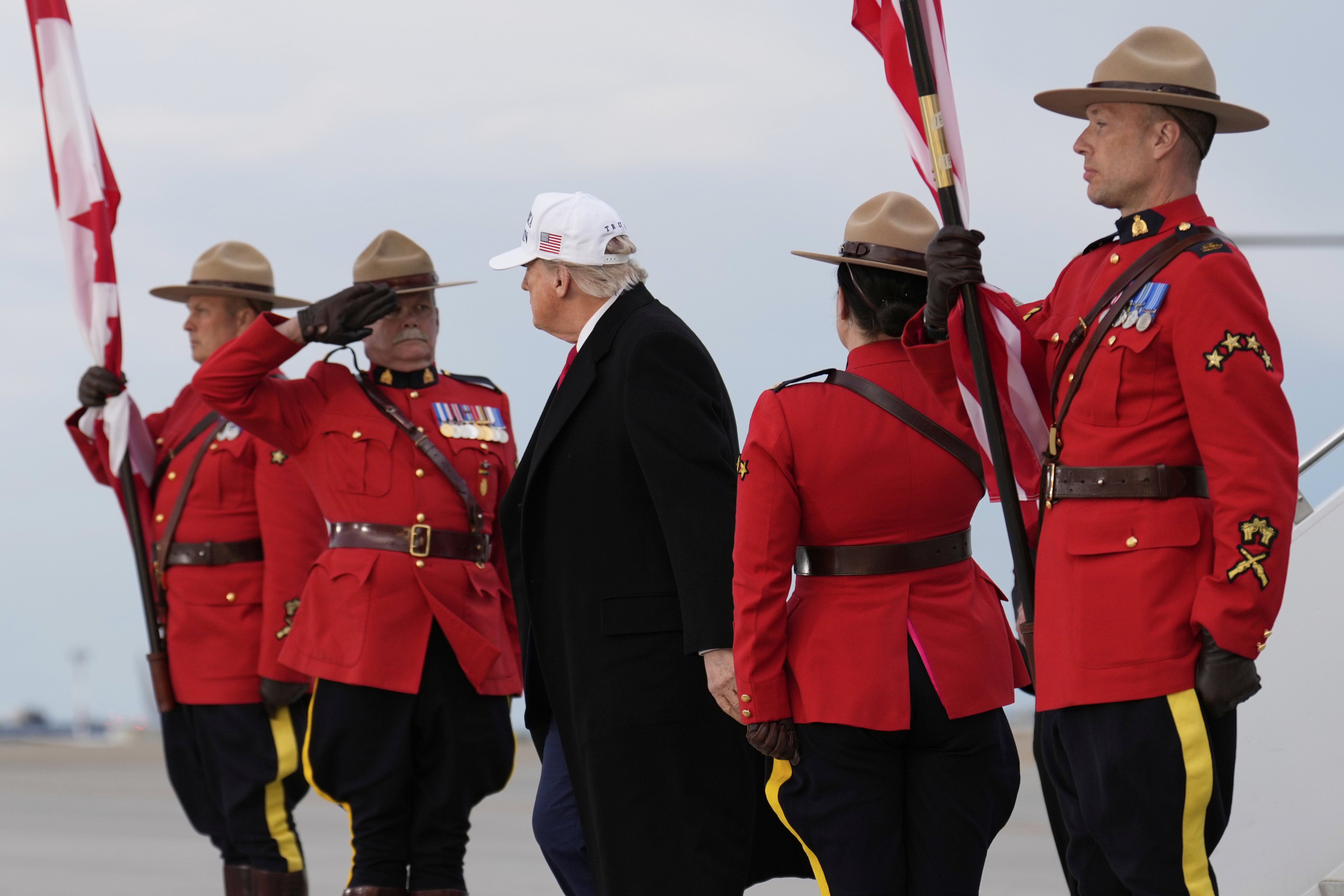 President Donald Trump arrives on Air Force One at Calgary International Airport, Sunday, June 15, 2025, in Calgary, Canada, ahead of the G7 Summit. (AP Photo/Mark Schiefelbein)