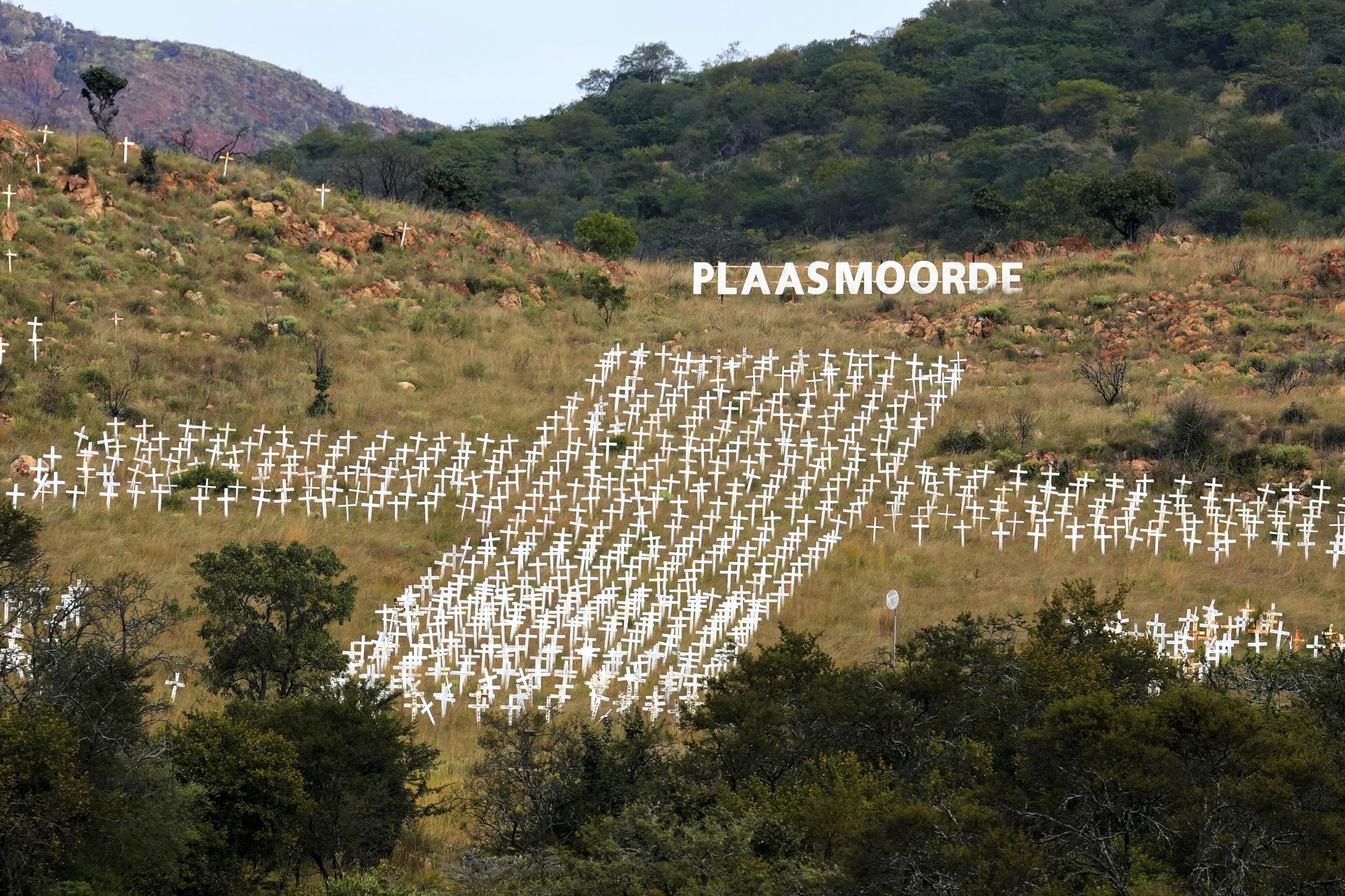 FILE - Crosses, memorializing white farmers who were killed, are seen at Witkruis Monument near Polokwane, South Africa, May 15, 2025. (AP Photo/Themba Hadebe, File)