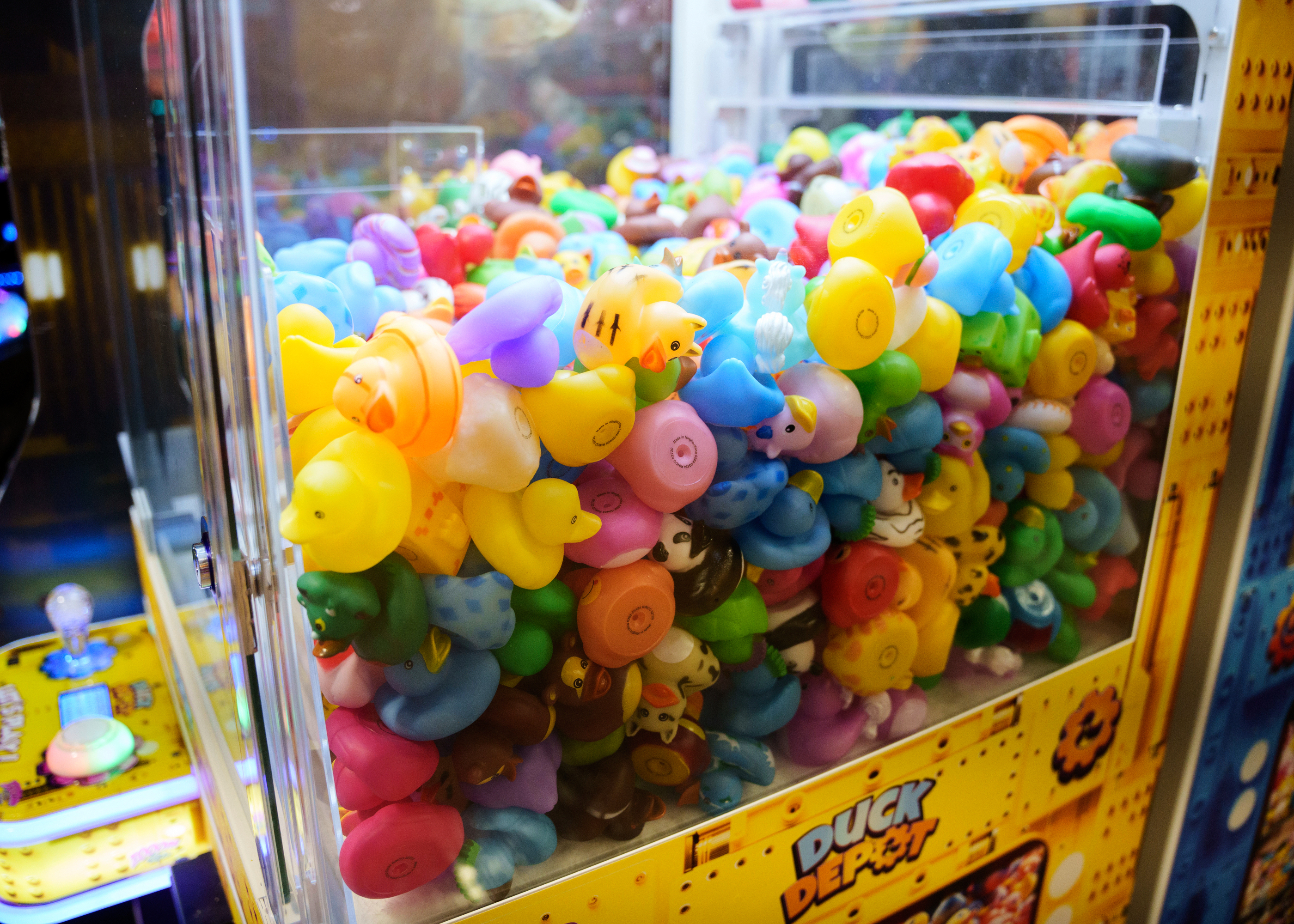 Rubber ducks in a claw machine at Playland's Castaway Cove amusement park, in Ocean City, N.J, on Friday, June 6, 2025. (AP Photo/Mingson Lau)